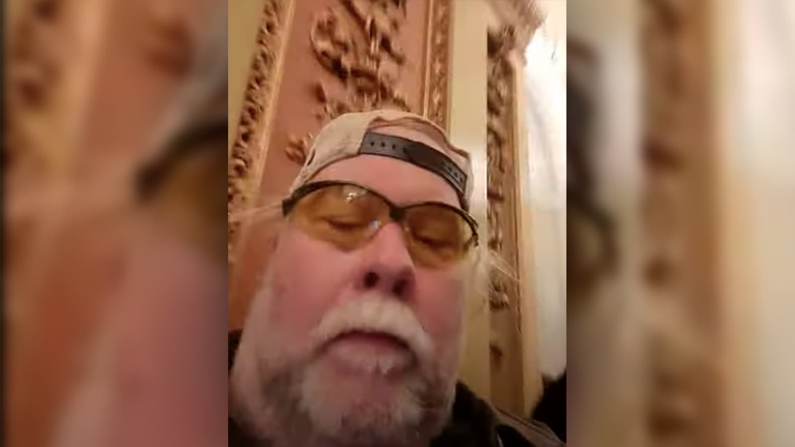 Russel Alford seen in footage he shot from inside the Capitol and posted to Youtube.