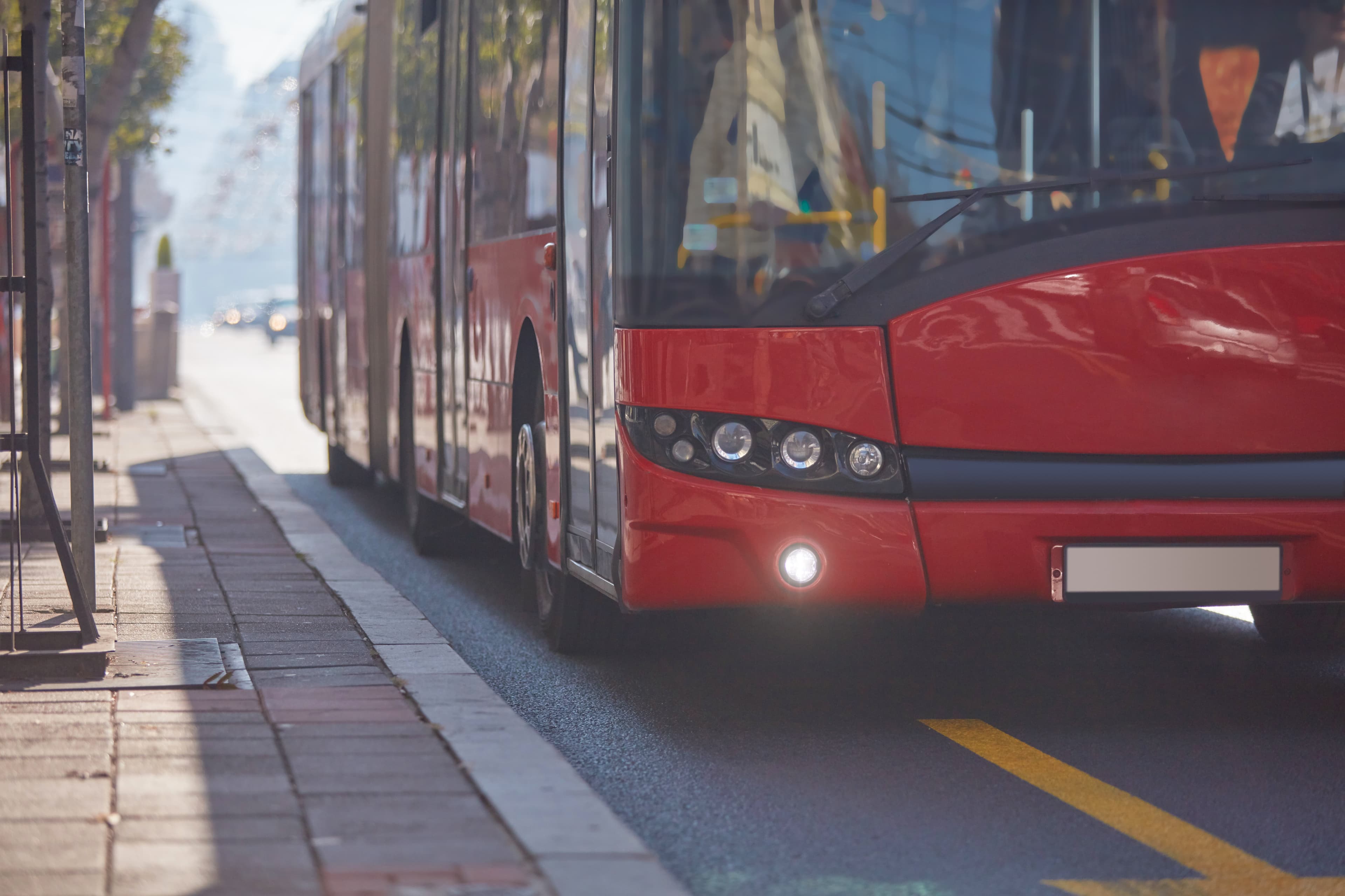 Public transportation / bus in urban surroundings on a station.