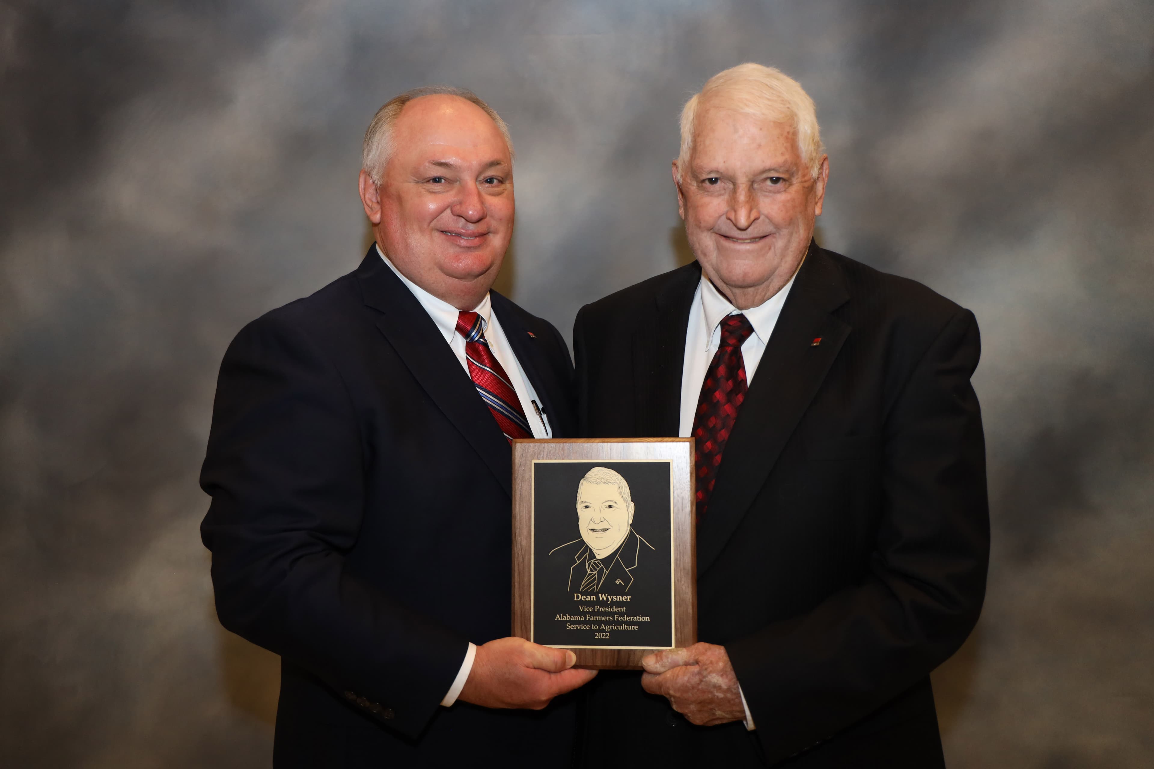 Randolph County farmer Dean Wysner, right, received the Alabama Farmers Federation Service To Agriculture Award Dec. 5 during the organization’s 101st annual meeting in Montgomery. Wysner is pictured with Federation President Jimmy Parnell.