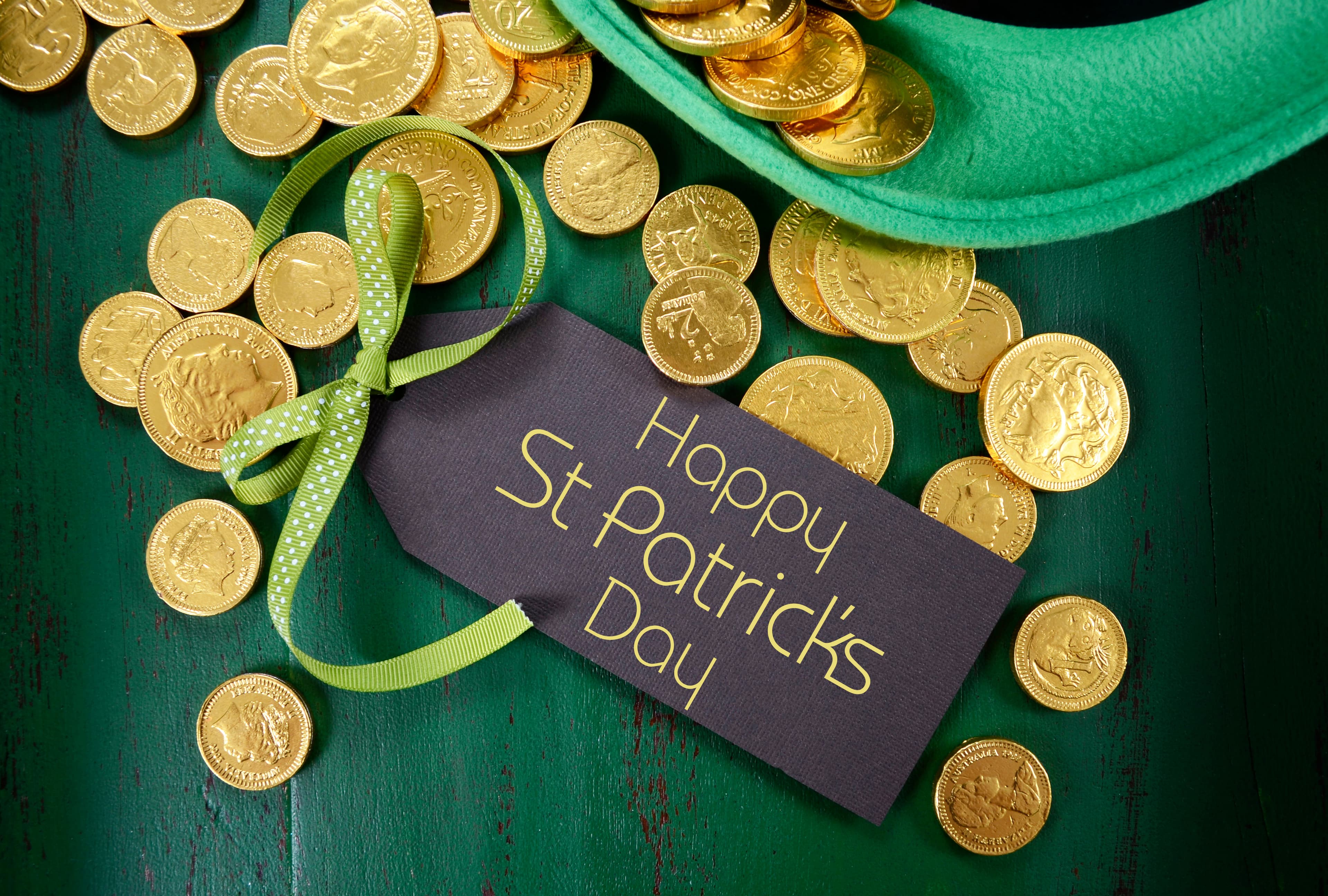 Happy St Patricks Day leprechaun hat with gold chocolate coins o