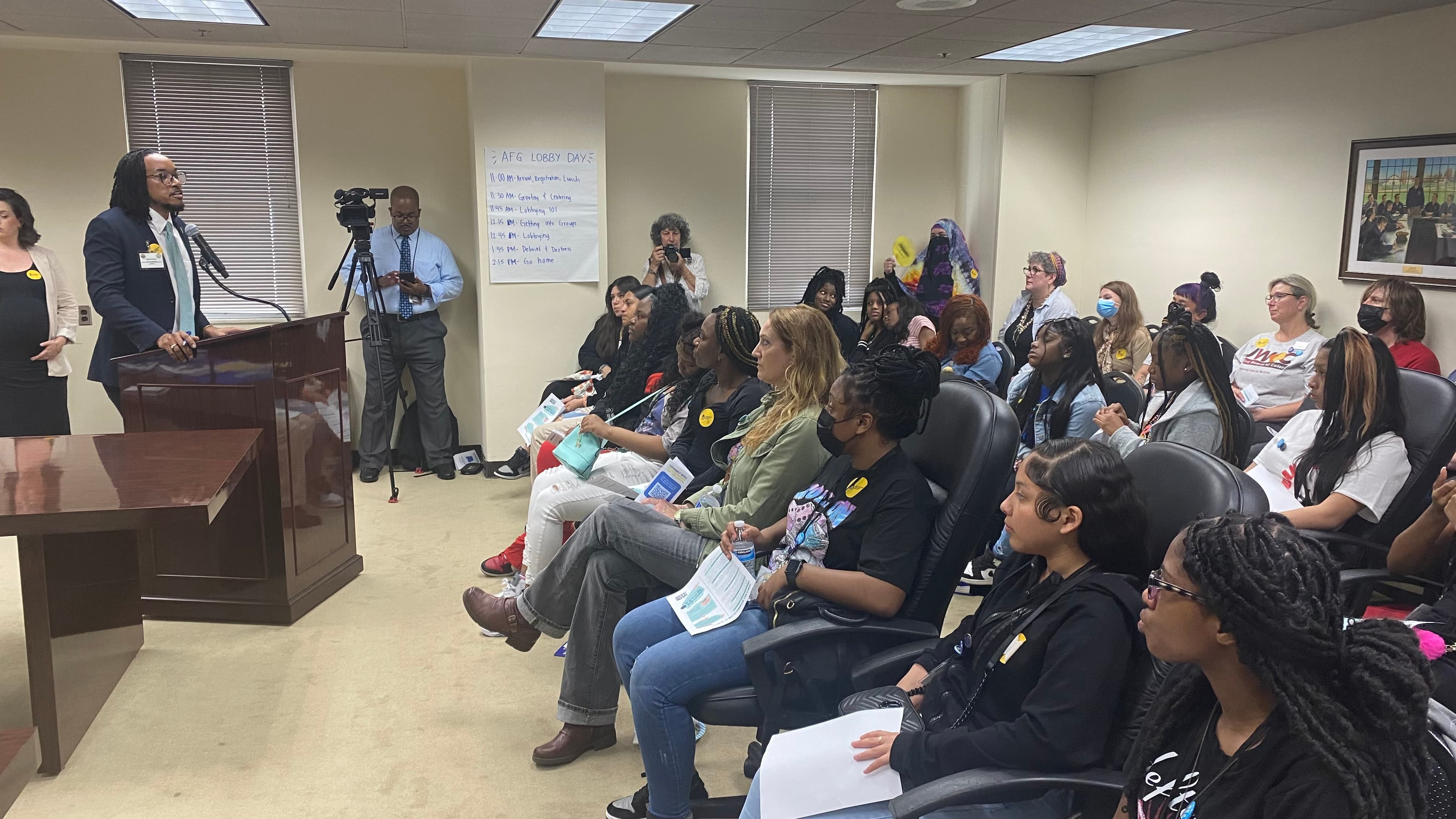 Dillon Nettles, policy and advocacy director for the ACLU of Alabama, speaks to advocates gathered to lobby for parole oversight.