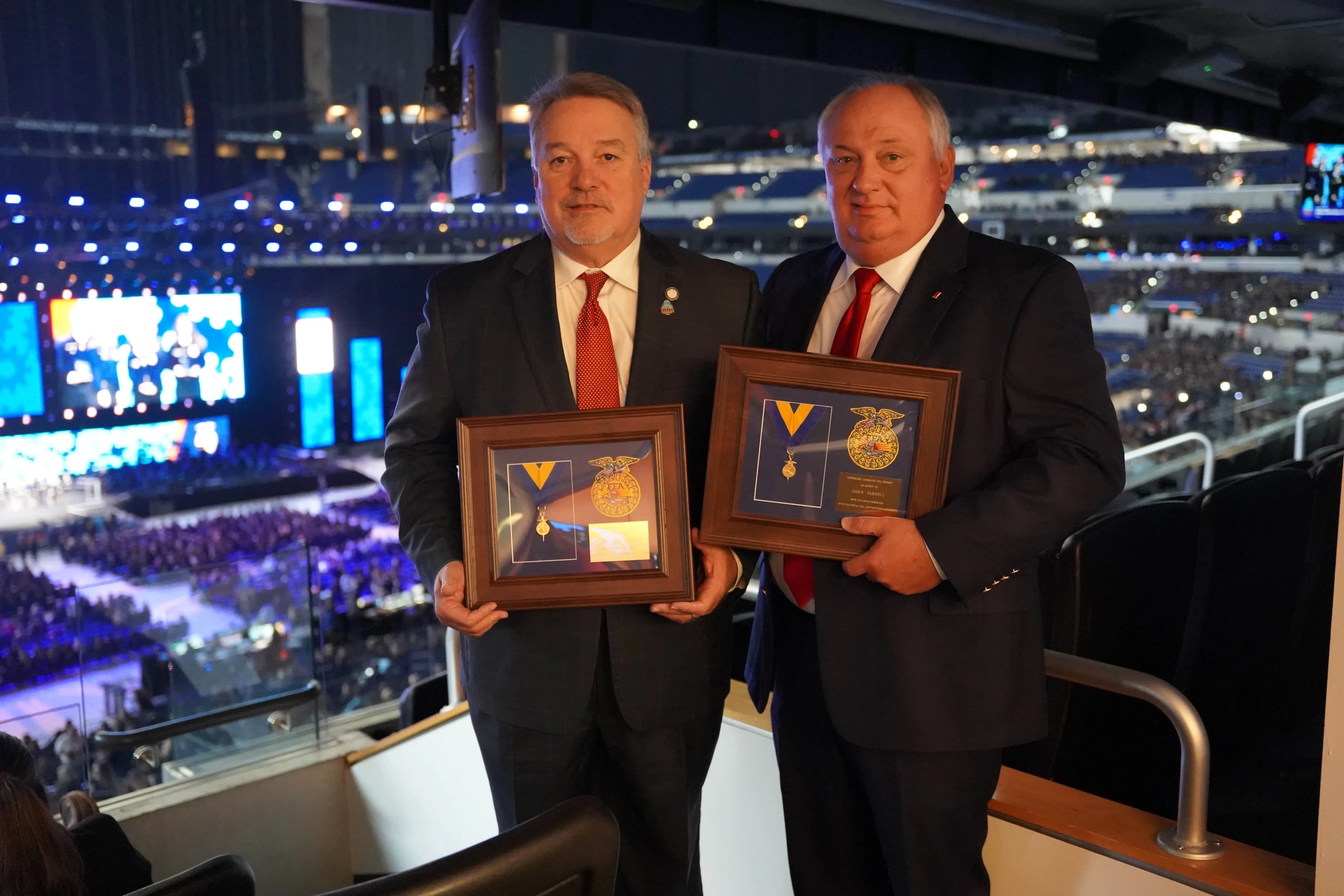 Alabama Farmers Federation President Jimmy Parnell, right, and Alabama Speaker of the House Nathaniel Ledbetter received their Honorary American FFA Degrees Oct. 25 during the 97th National FFA Convention in Indianapolis. This degree is awarded to those who have shown outstanding service to FFA and agriscience education on state and national levels.