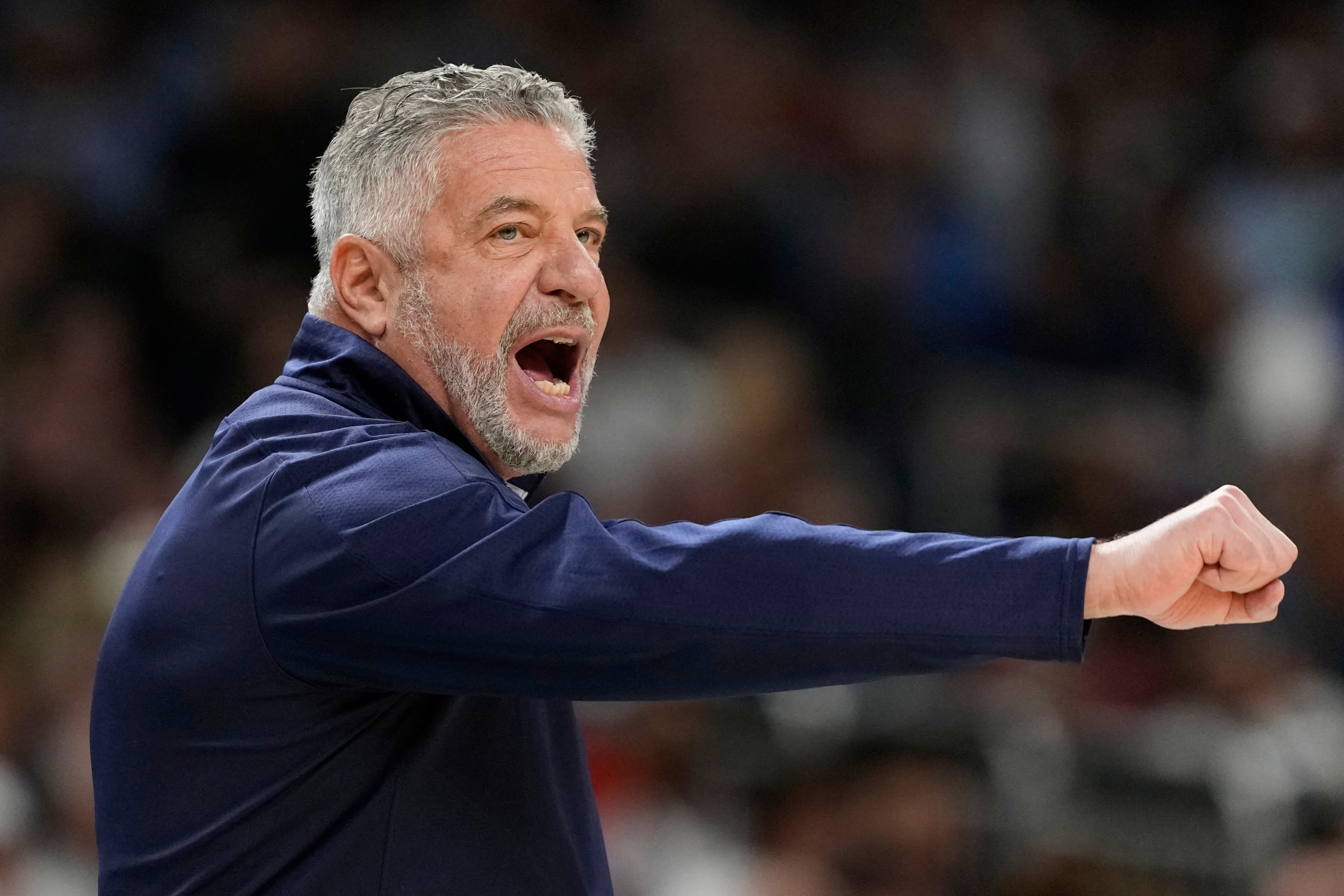 Auburn head coach Bruce Pearl calls a play during the first half in the national semifinals at the Final Four of the NCAA college basketball tournament, Saturday, April 5, 2025, in San Antonio.