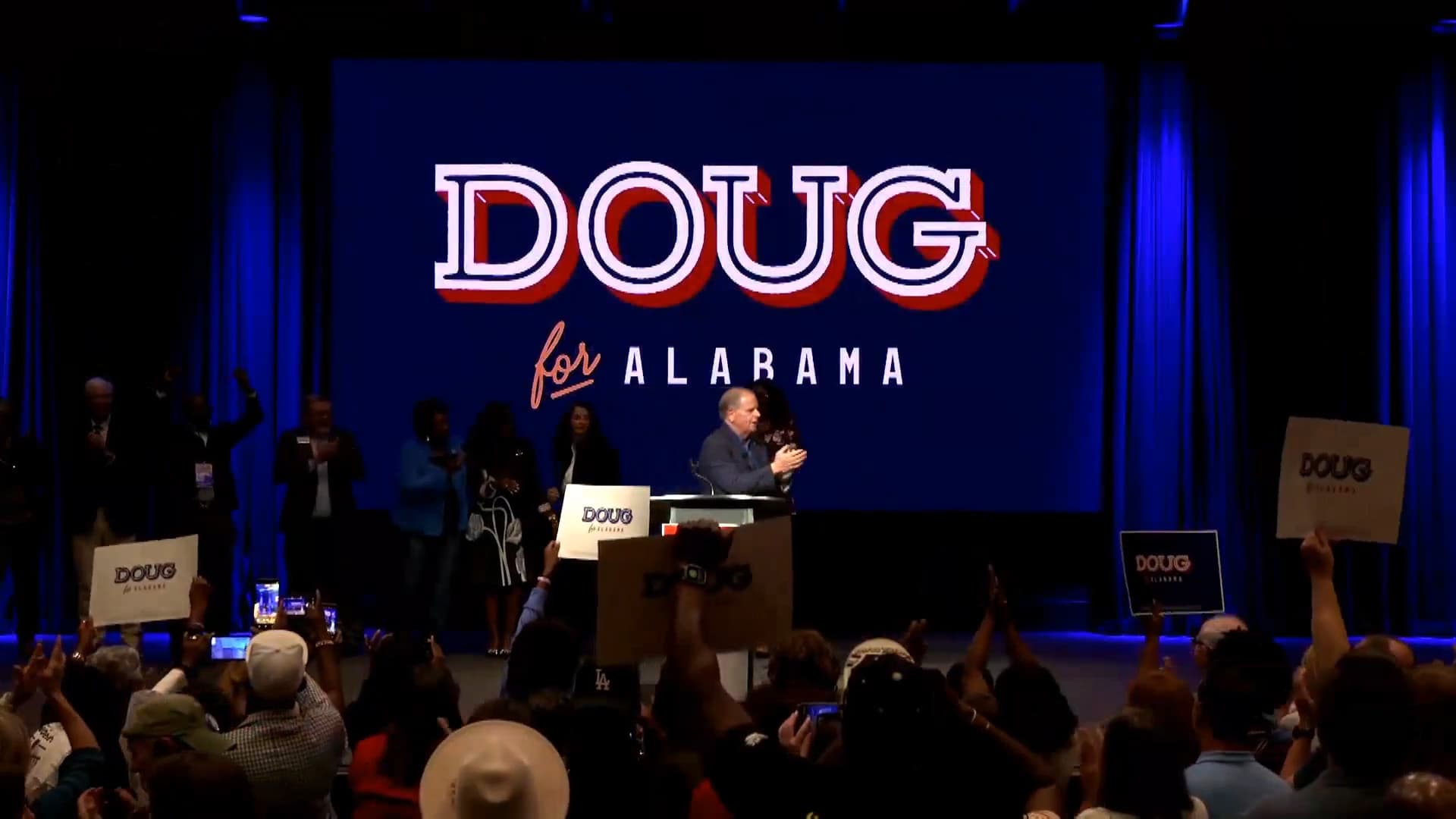 Gubernatorial candidate Doug Jones holds a rally in Madison County on October 11.