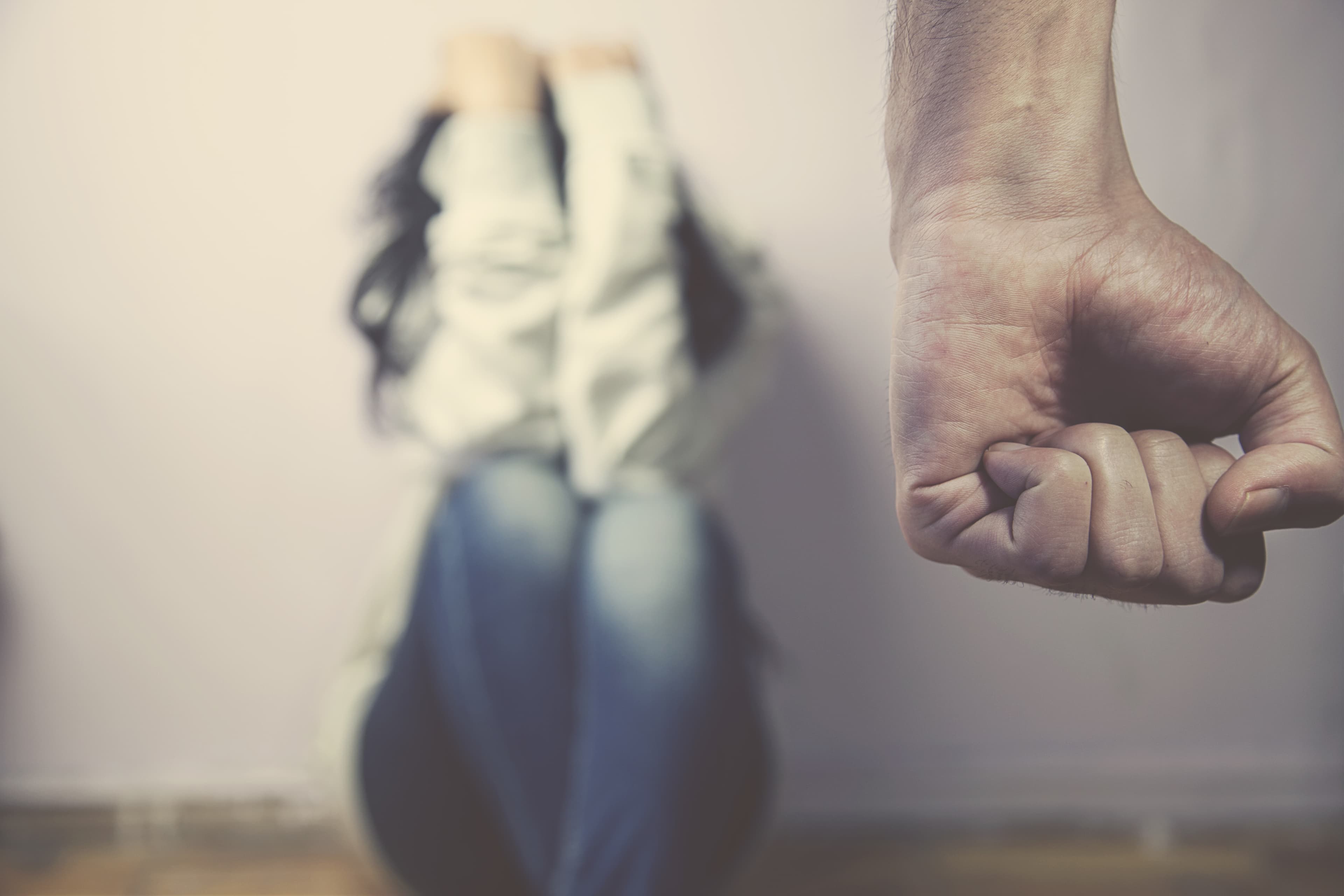 Man about to beat his wife