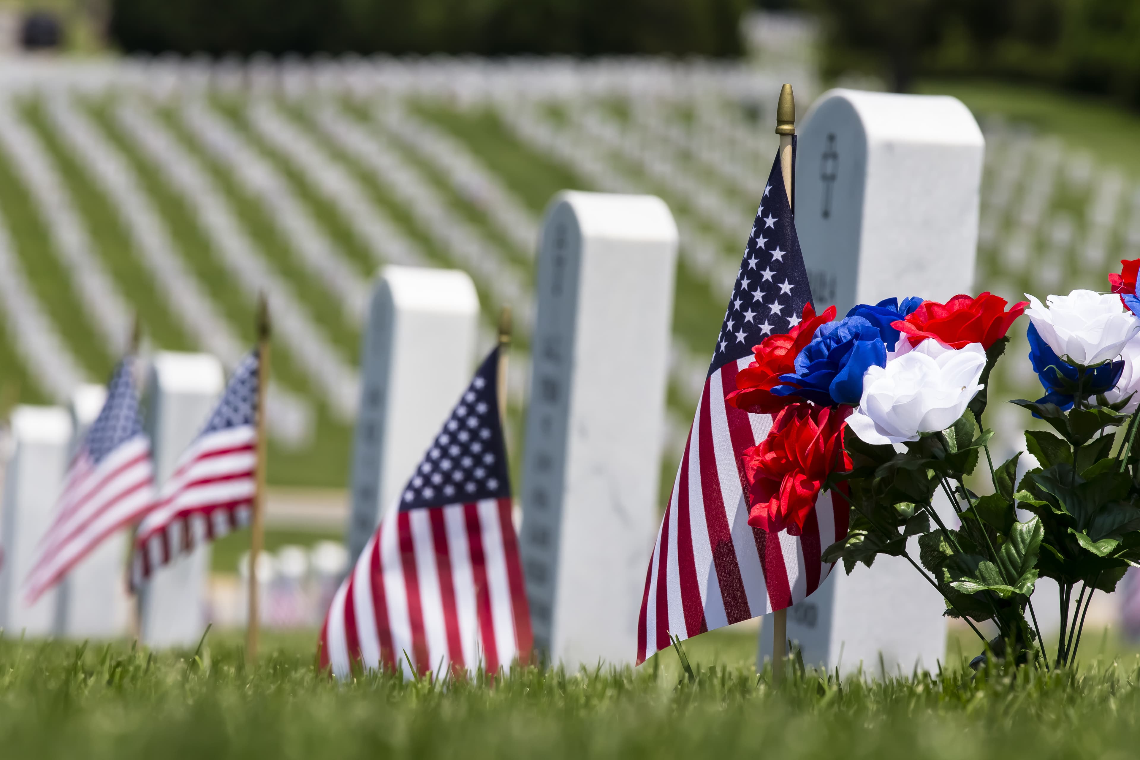 veterans cemetery memorial celebration with American Flag