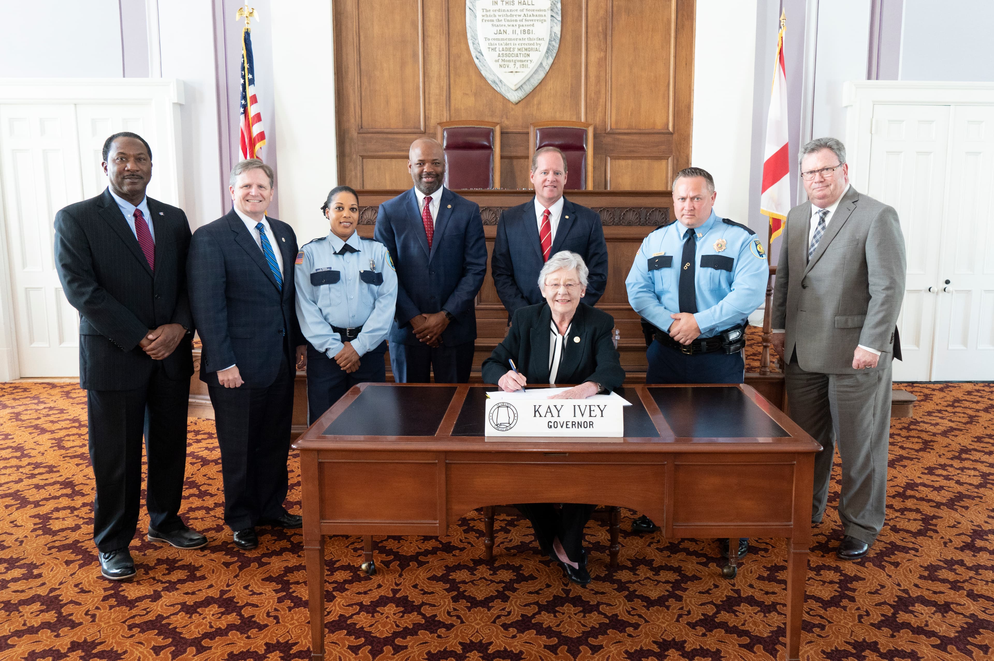 Governor Kay Ivey signs HB468 in the Old House Chamber Wednesday, May 29, 2019 in Montgomery, Ala. This bill provides a two-step salary increase for certain employees of the Department of Corrections (DOC) in specified classifications; allows certain employees to receive payment for any accrued and unused annual leave in excess of 480 hours, up to a specified amount; and expands the bonus incentive program of DOC to include bonus payments for additional training achievements. (Governor's Office/Hal Yeager)