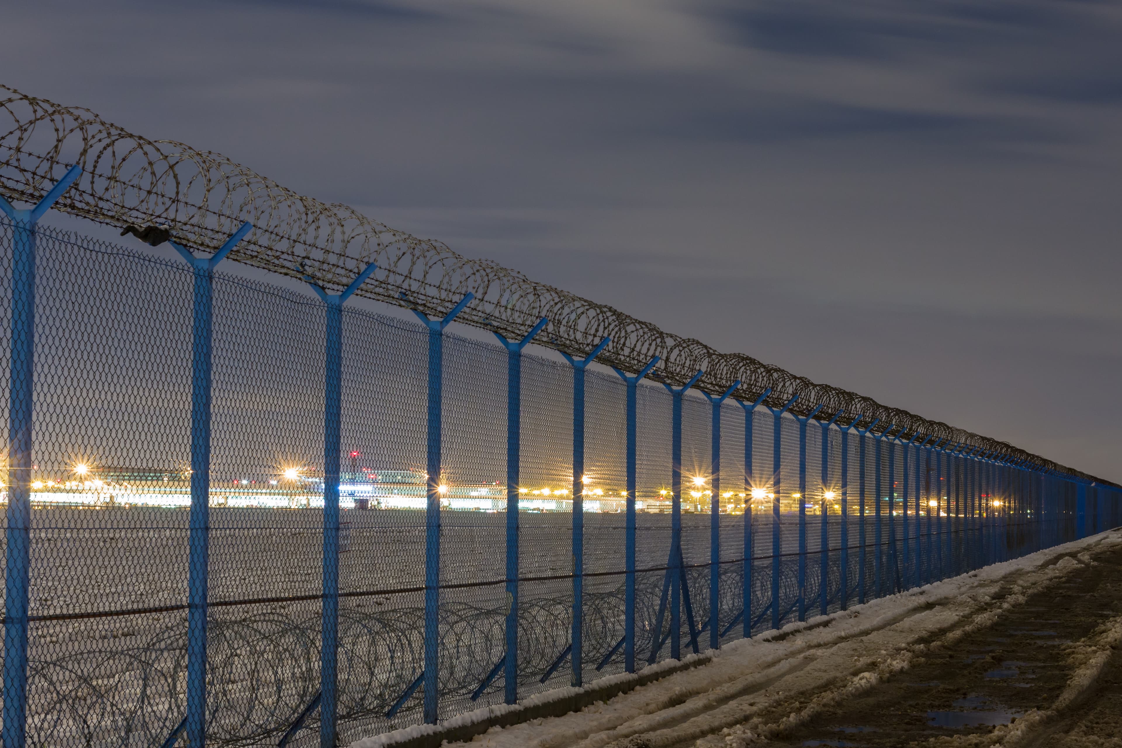 Fence with barbed wire, restricted area *** Local Caption *** Fence with barbed wire, restricted area