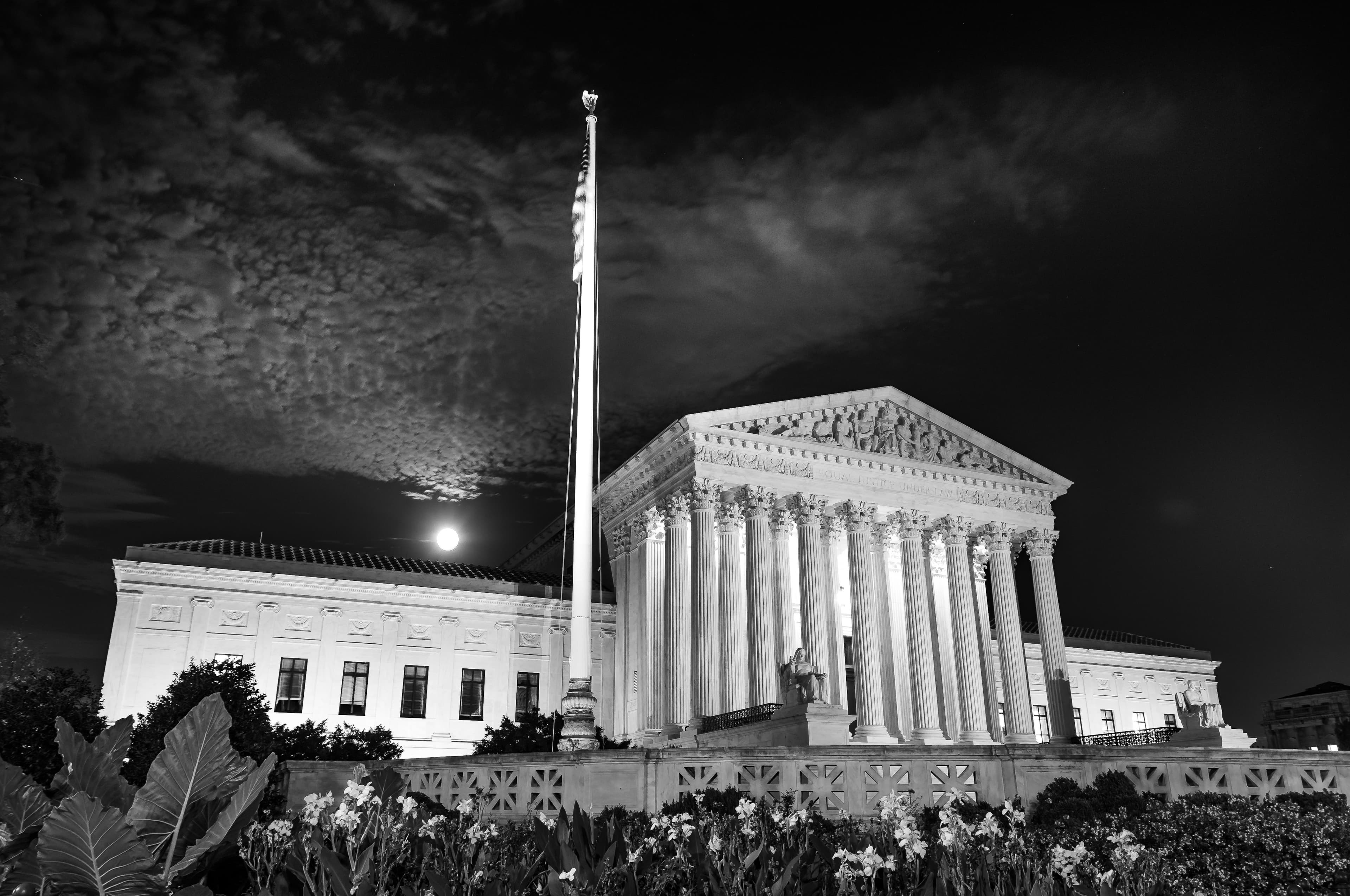 Black and white image of the United States supreme courts buildi