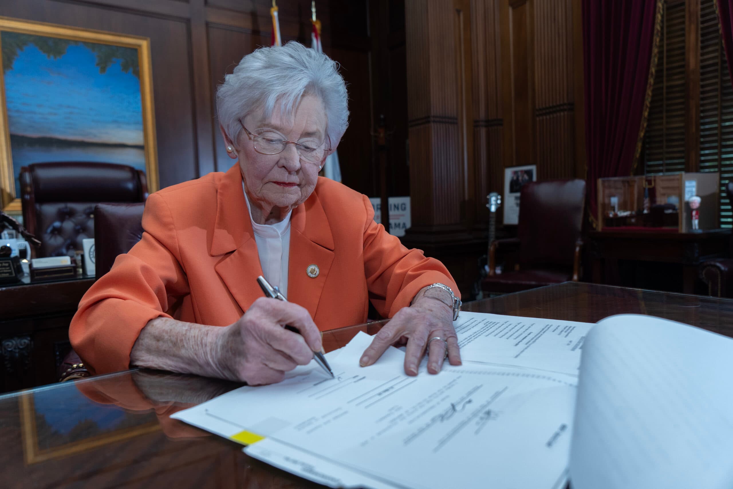 Gov. Kay Ivey signs the Alabama Post-Election Audit Act into law.