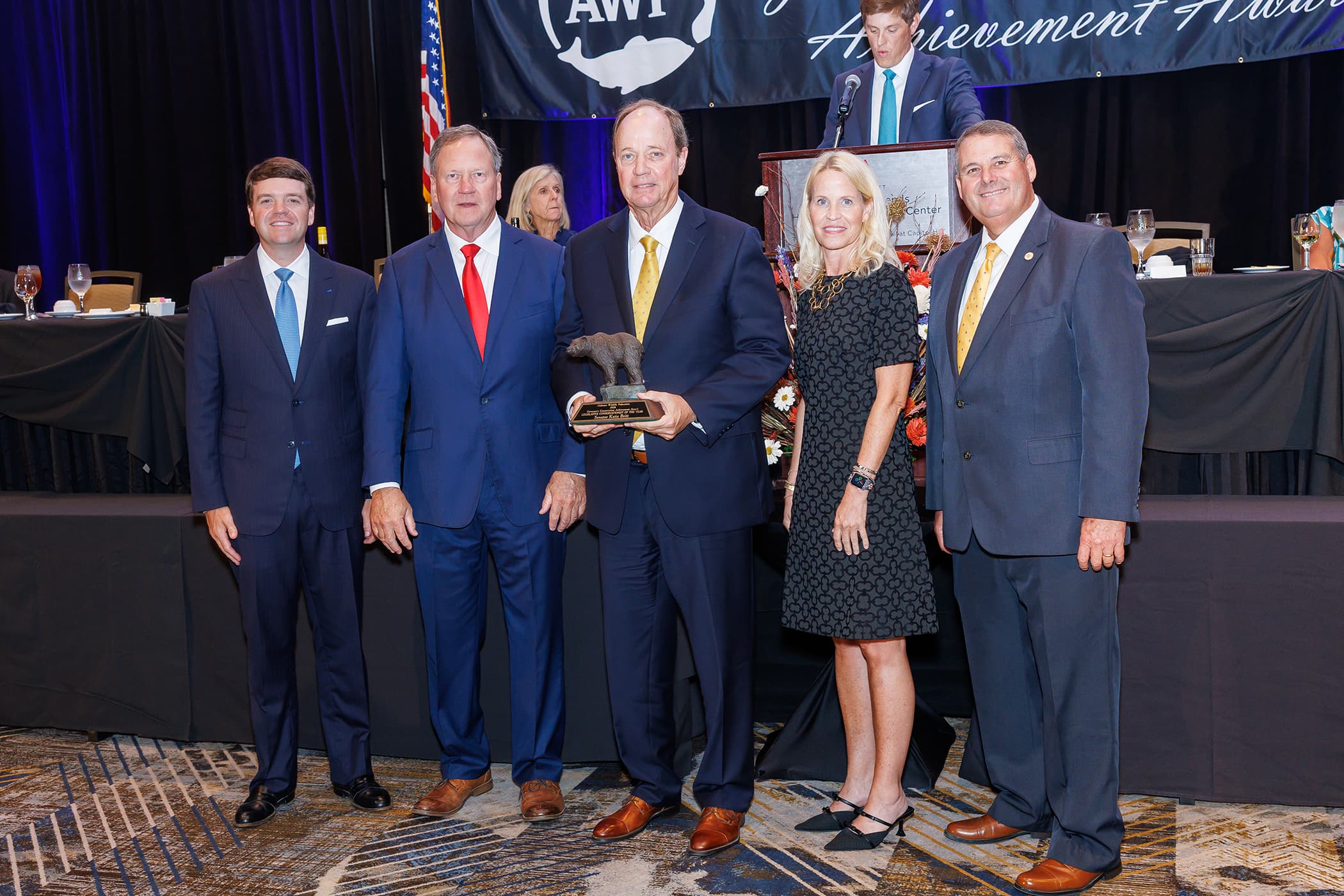 Presenting the awards were Taylor Williams with PowerSouth Energy; Tim Wood, AWF President; Nicole Faulk with Alabama Power Company; and Chris Blankenship, Conservation Commissioner. Julian Boyd accepted the award on behalf of Senator Katie Britt.