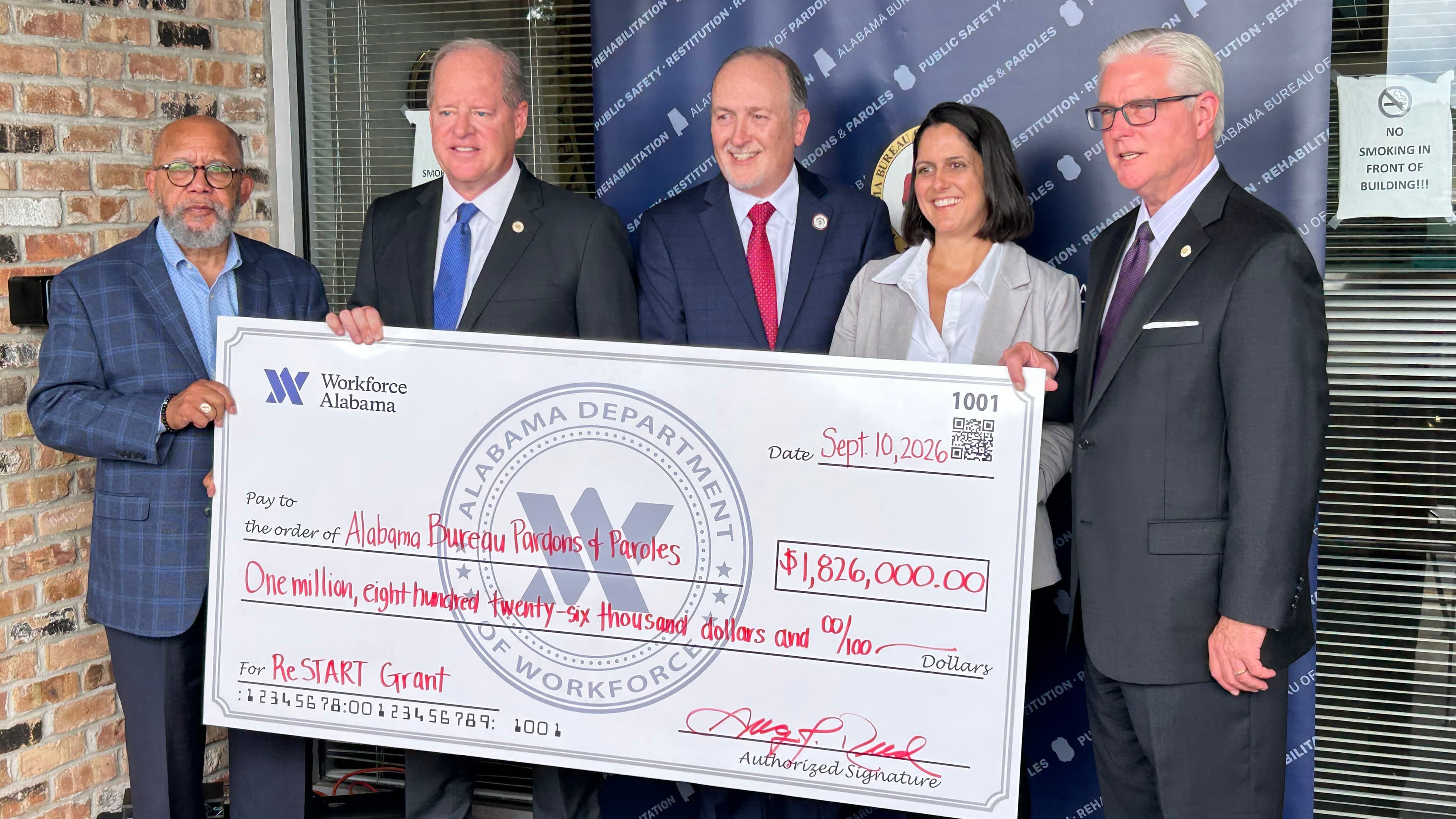 A $1.8 million check is delivered to fund new programs within the Alabama Bureau of Pardons and Paroles.