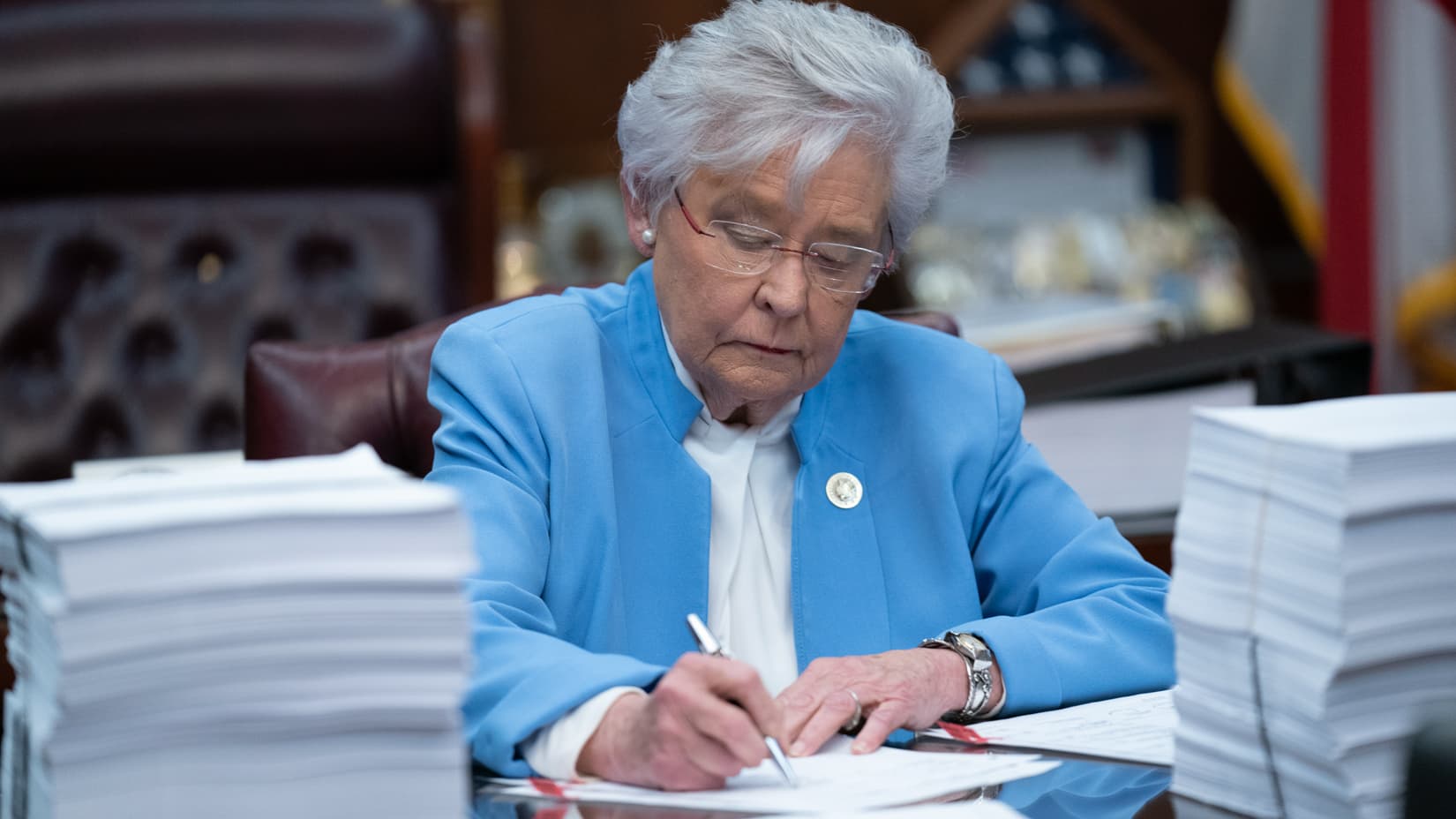 Gov. Kay Ivey signing a lease agreement to build new prisons in Alabama. (VIA GOVERNOR'S OFFICE)