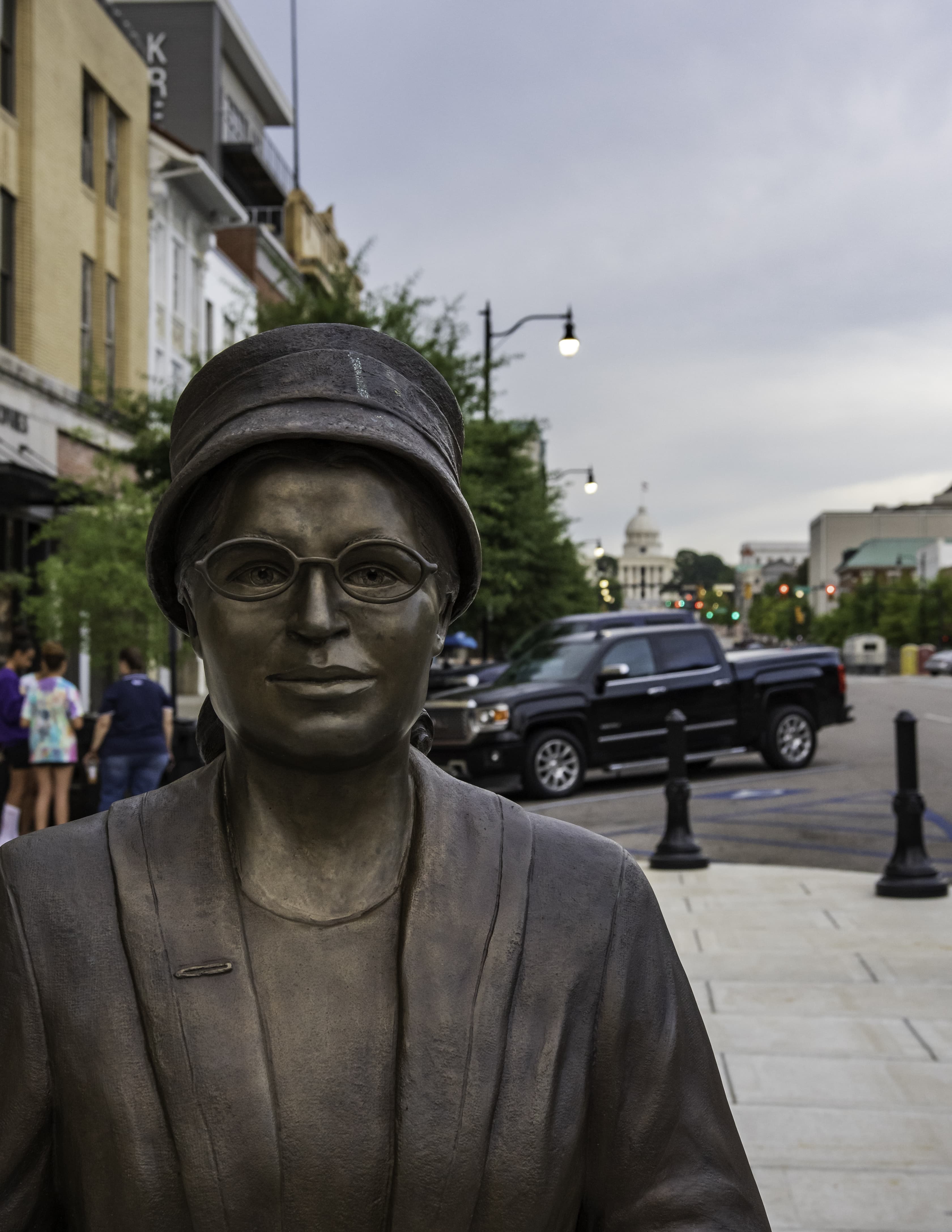 Portrait of bronze statue of Rosa Parks and plaque located in Court Square in downtown Montgomery.