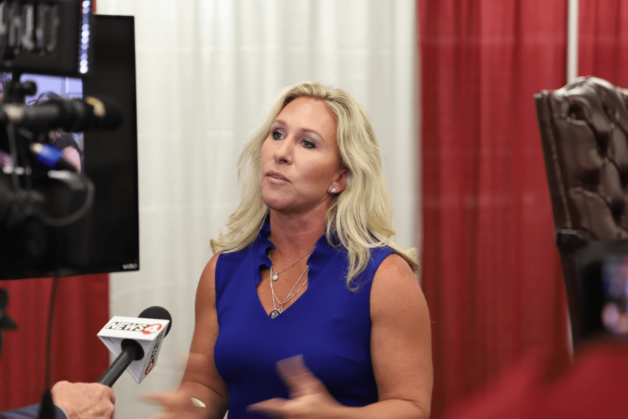 Marjorie Taylor Greene speaking at the Alabama Federation of Republican Women event. (Grady Thornton)