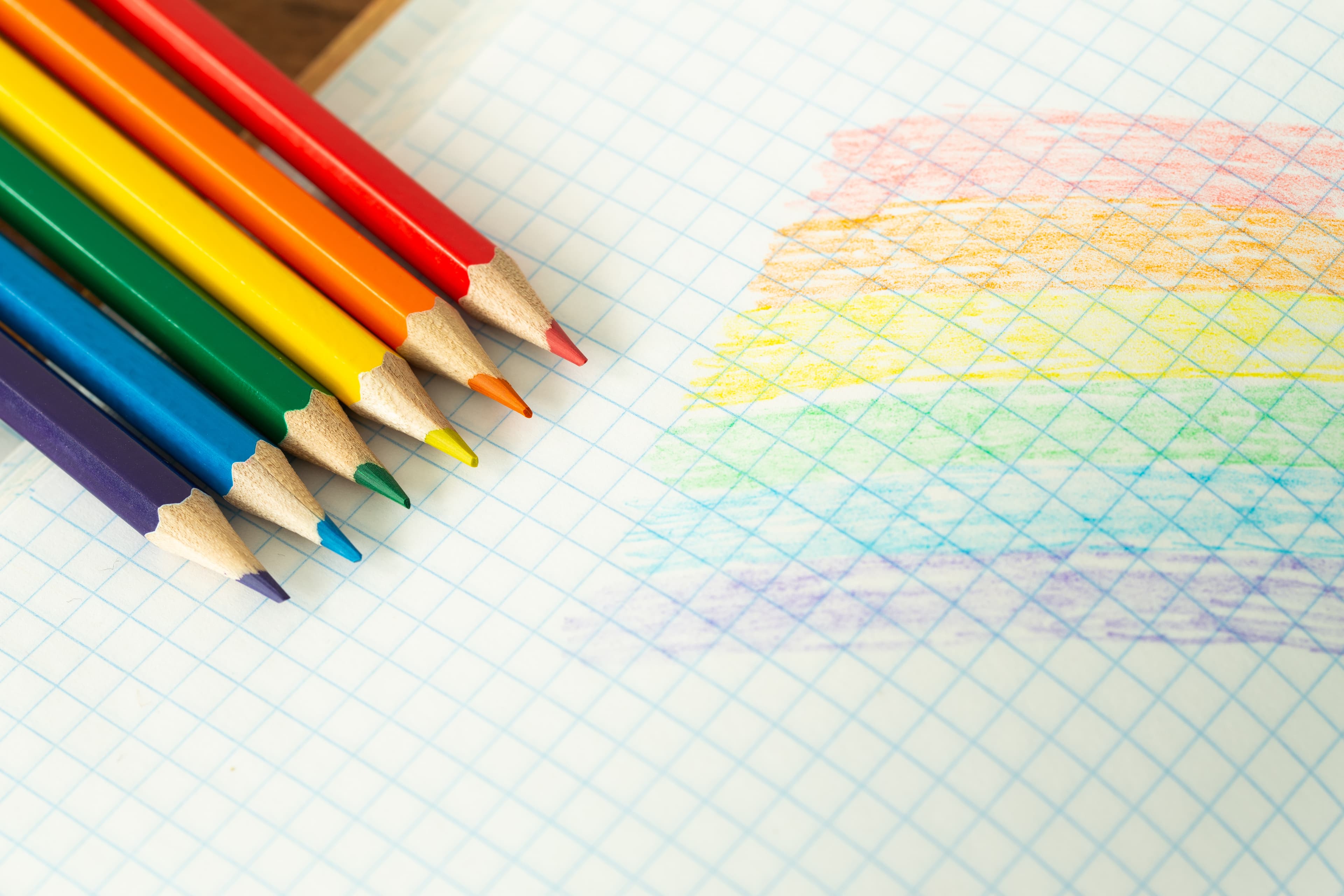 LGBTQ+ flag drawn in a school notebook