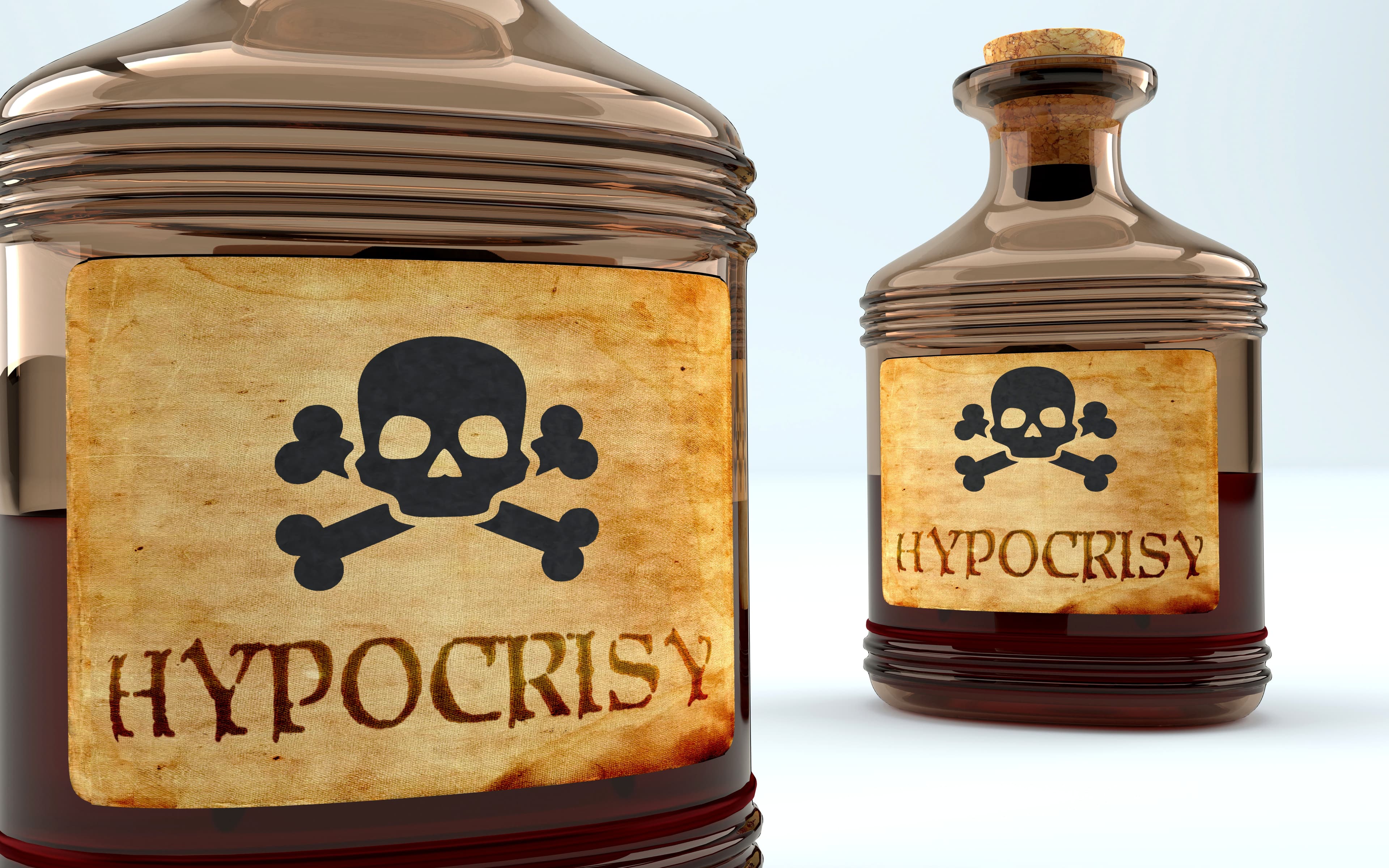 Dangers and harms of hypocrisy pictured as a poison bottle.