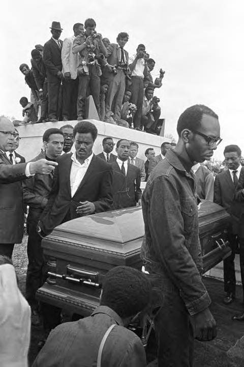 Pallbearers, including Rev. T. Y. Rogers, around Martin Luther King, Jr.'s casket at the burial site on April 9, 1968. (Courtesy of Alabama Dept. of Archives & History)