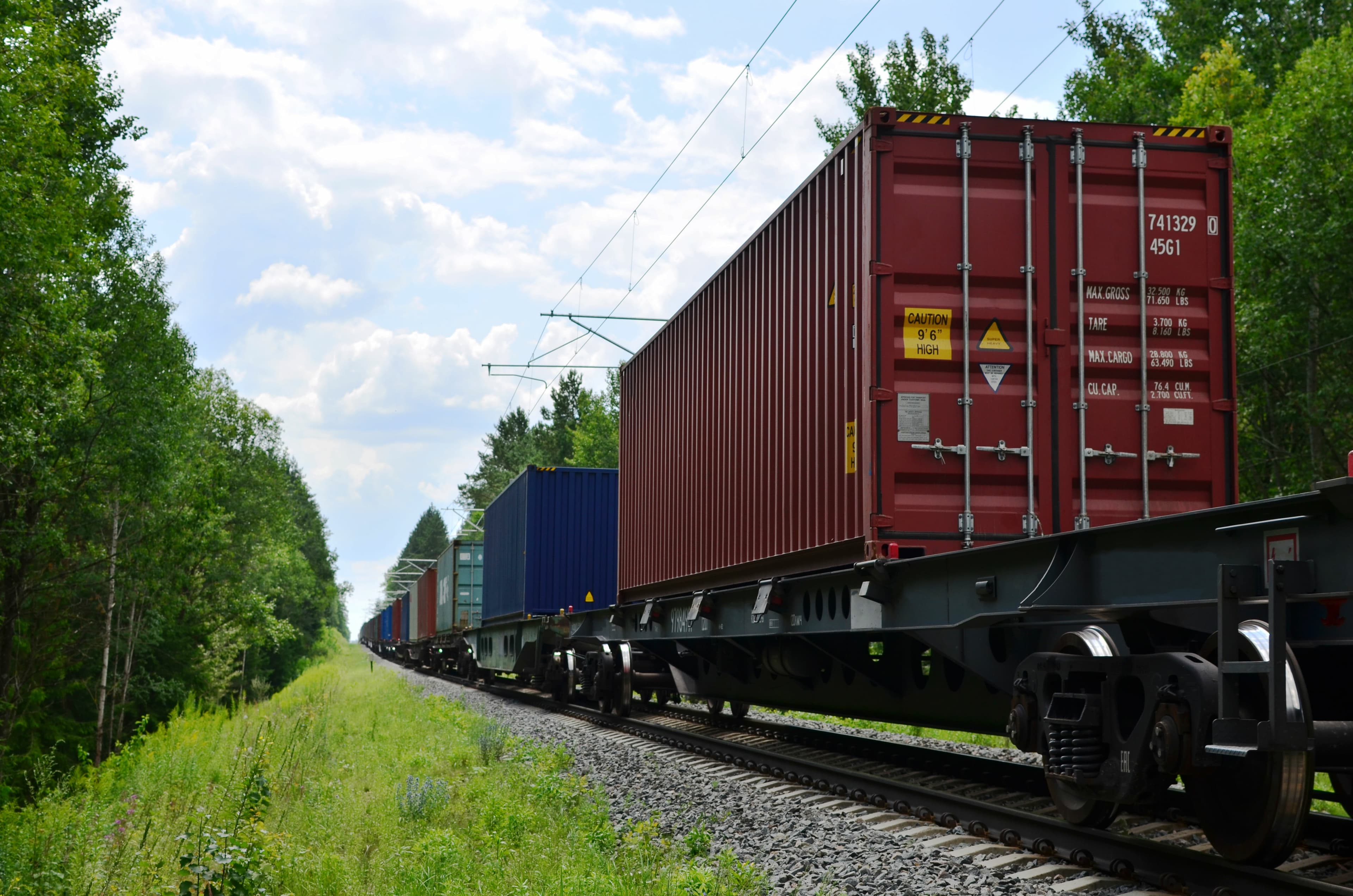 Freight train, transportation of railway cars by cargo container