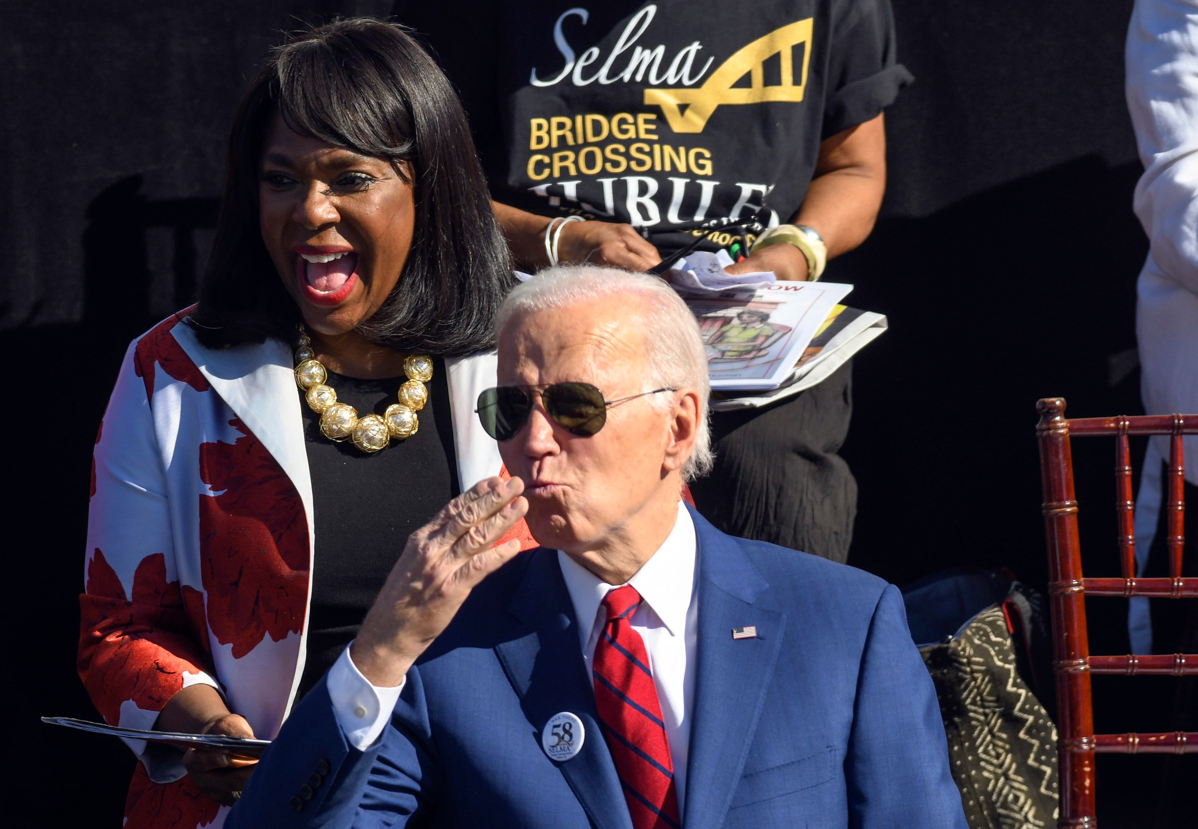 President Joe Biden blows a kiss to the crowd alongside Rep. Terri Sewell, D-Ala., left, in Selma, Ala., Sunday, March 5, 2023, during an event to commemorate the 58th anniversary of “Bloody Sunday,” a landmark event of the civil rights movement.