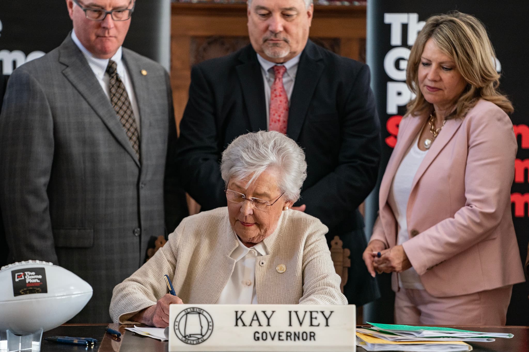 Governor Kay Ivey signed ”The Game Plan” legislation with members of the Alabama legislature in the State Capitol Old House Chamber Thursday April 20, 2023 in Montgomery, Ala.