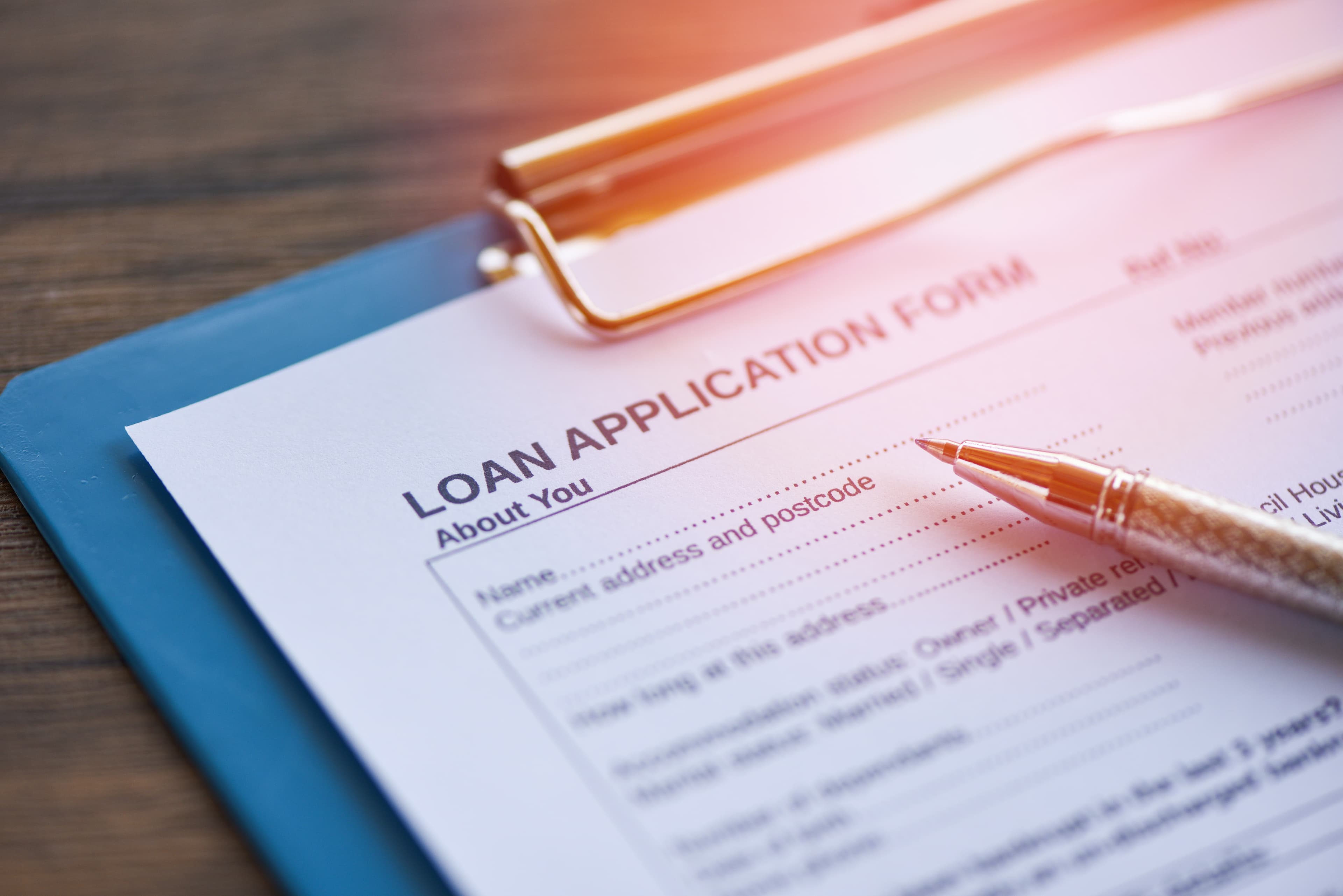 Loan application form with pen on paper / financial loan negotia