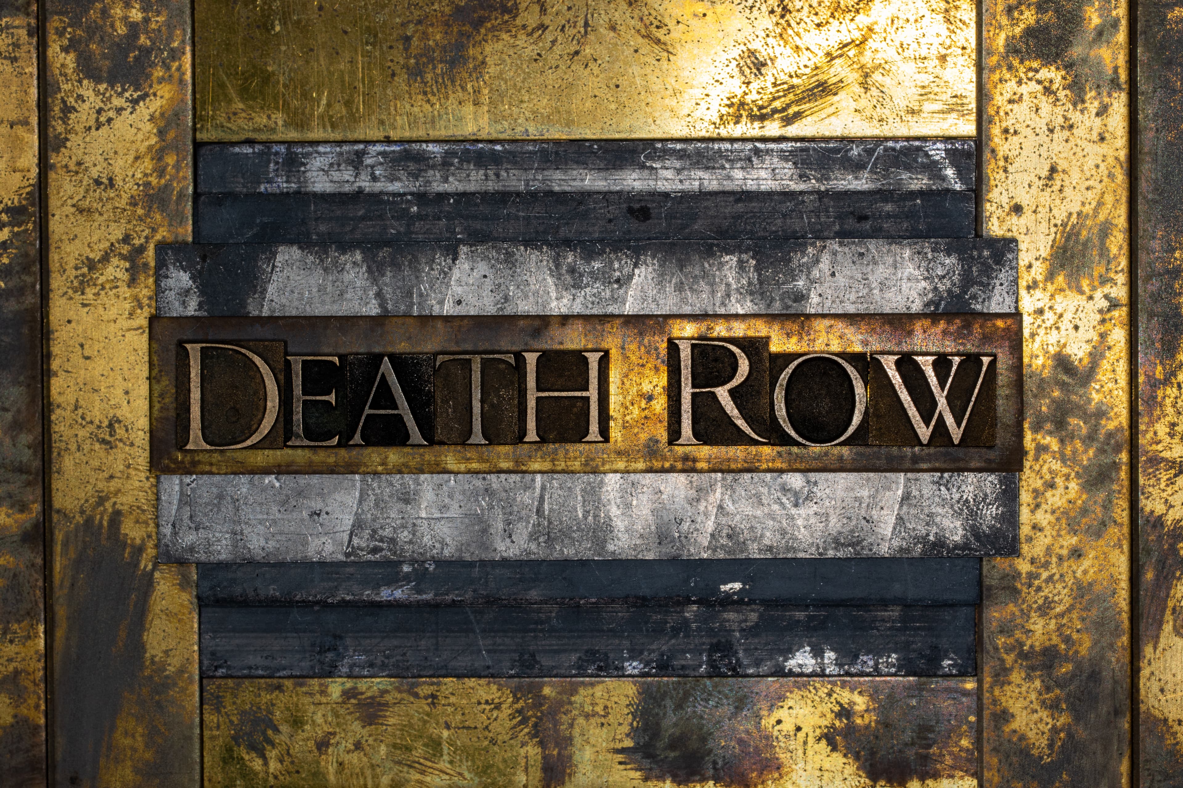 Death Row text on grunge lead with textured copper and gold background