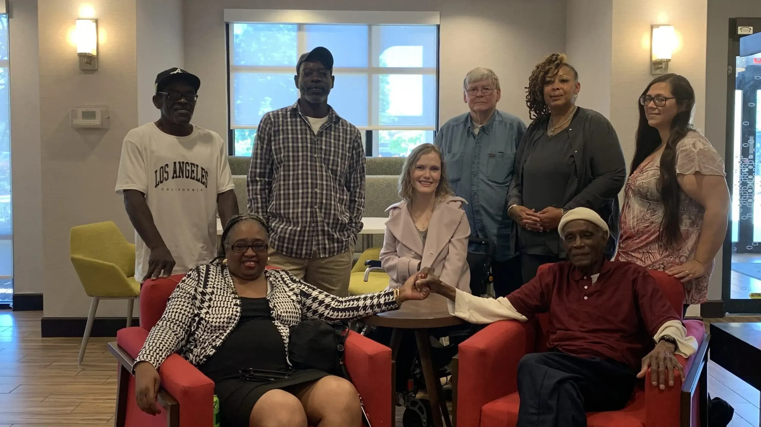 Robert George, bottom right, with family, friends and supporters after his release from prison.