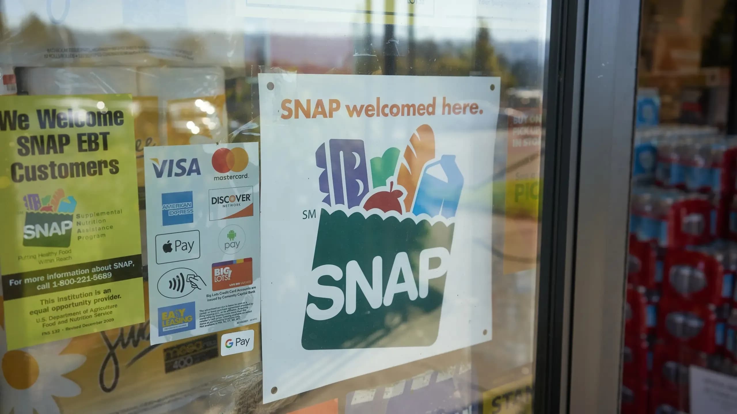 Portland, OR, USA - Oct 28, 2020: "SNAP welcomed here" sign is seen at the entrance to a Big Lots store in Portland, Oregon. The Supplemental Nutrition Assistance Program (SNAP) is a federal program.