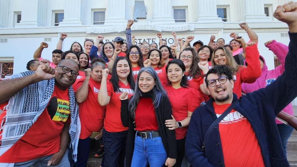 Members of the Alabama Coalition for Immigrant Justice rally on the steps of the Alabama Statehouse. (Photo via ACIJ Facebook)