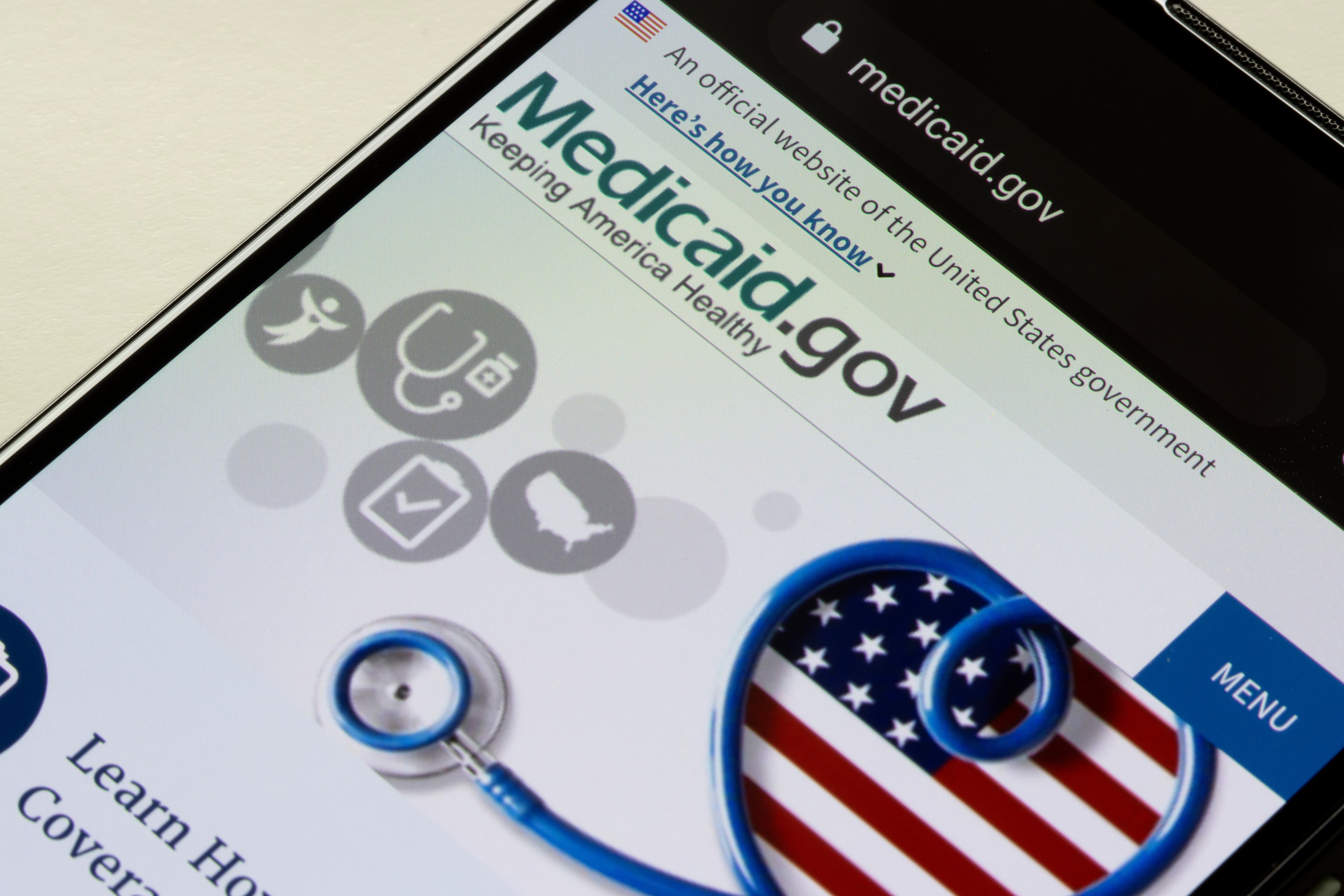 Portland, OR, USA - Nov 29, 2021: Closeup of the homepage of Medicaid.gov seen on a smartphone. Medicaid provides free or low-cost health coverage to eligible needy persons.