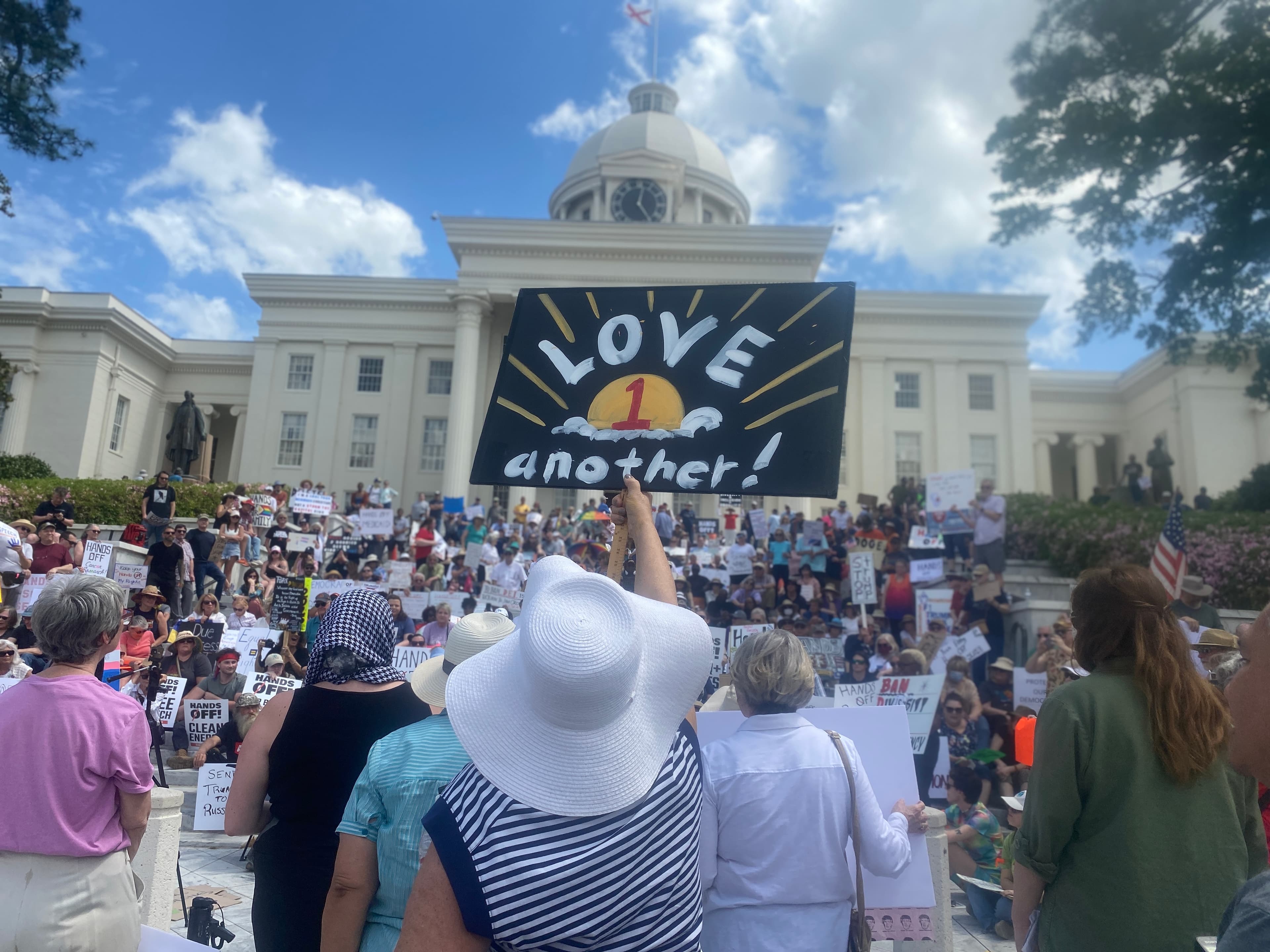Protesters gather at the Alabama State Capitol Saturday to voice opposition to Donald Trump's second Presidential term.