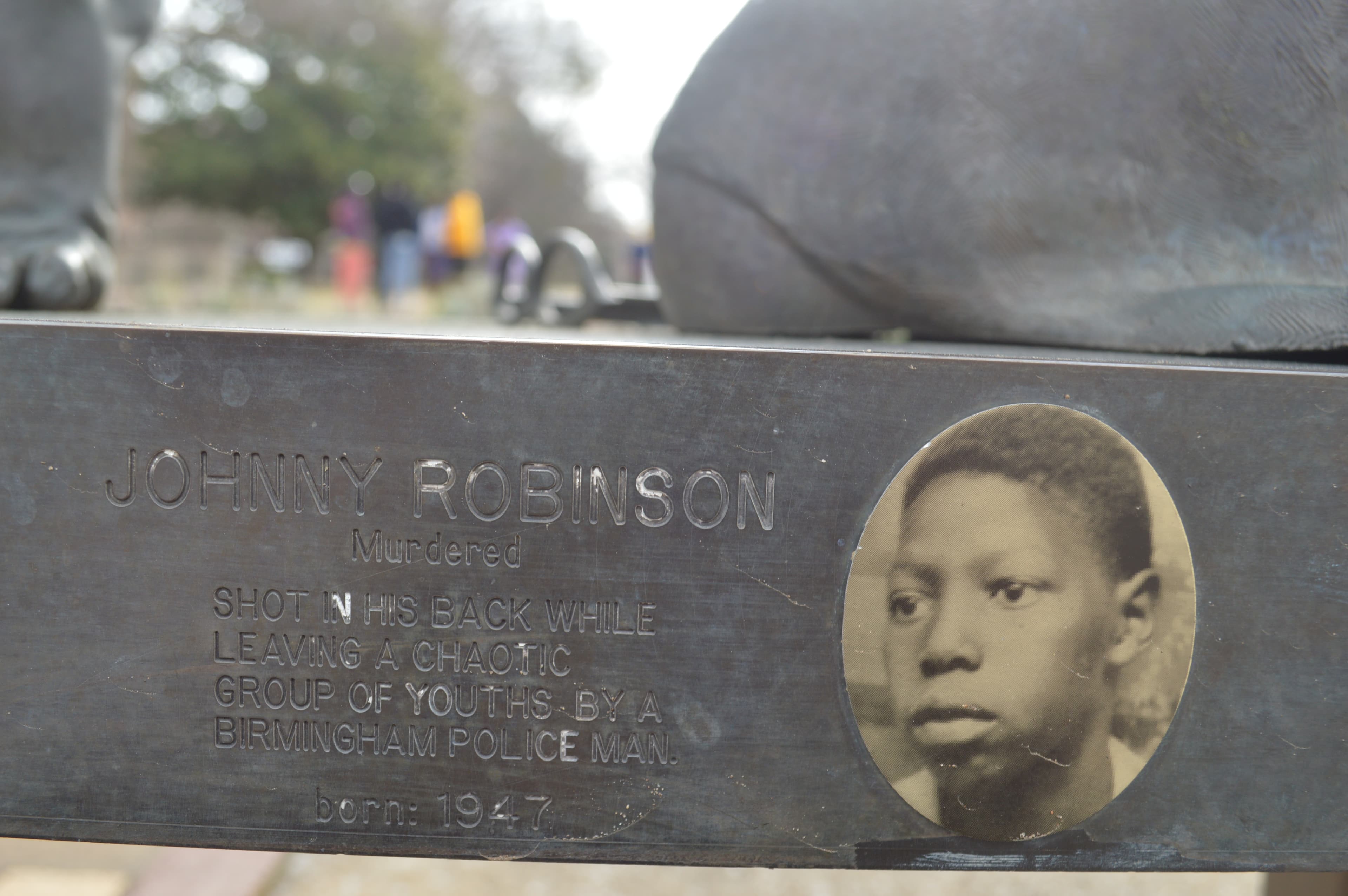 Virgil Ware on Four Spirits sculpture by Elizabeth MacQueen in Kelly Ingram Park.