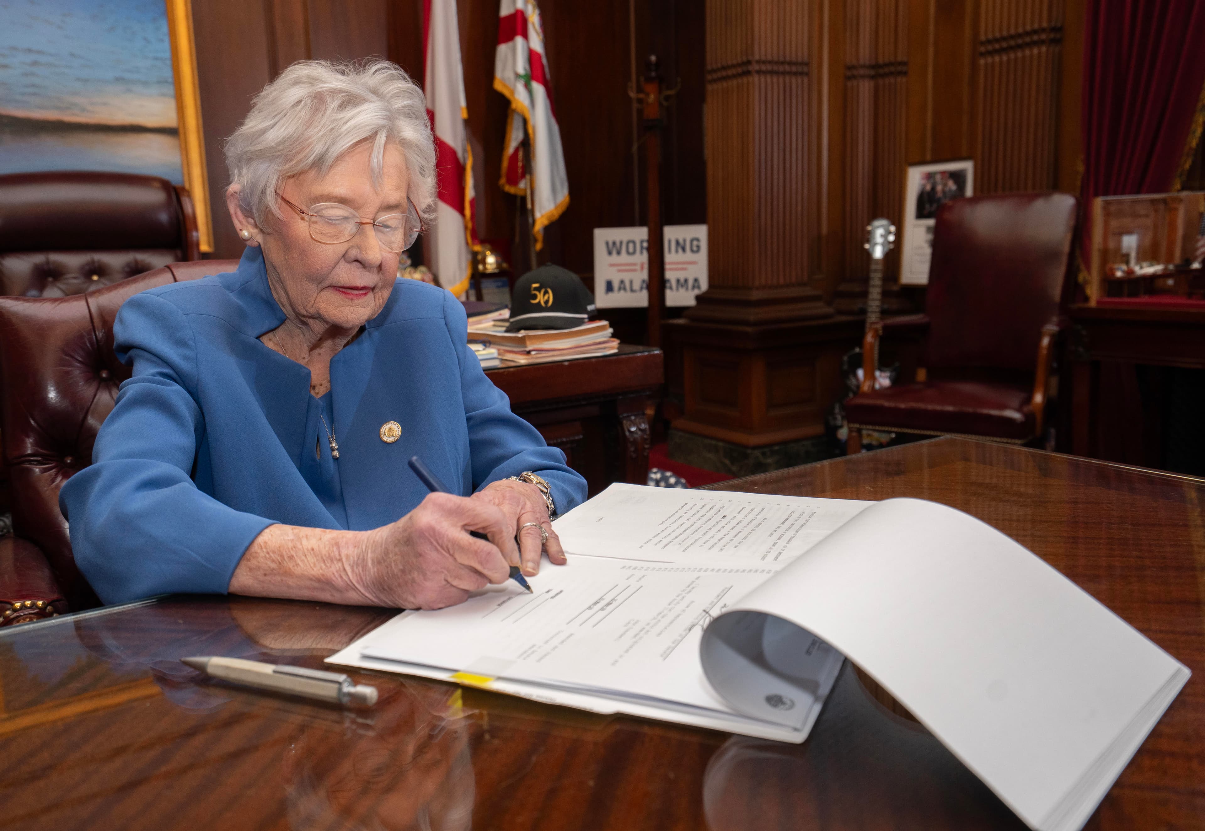 Governor Kay Ivey signs Sarah Marsh Heaven’s 27 Camp Safety Act.