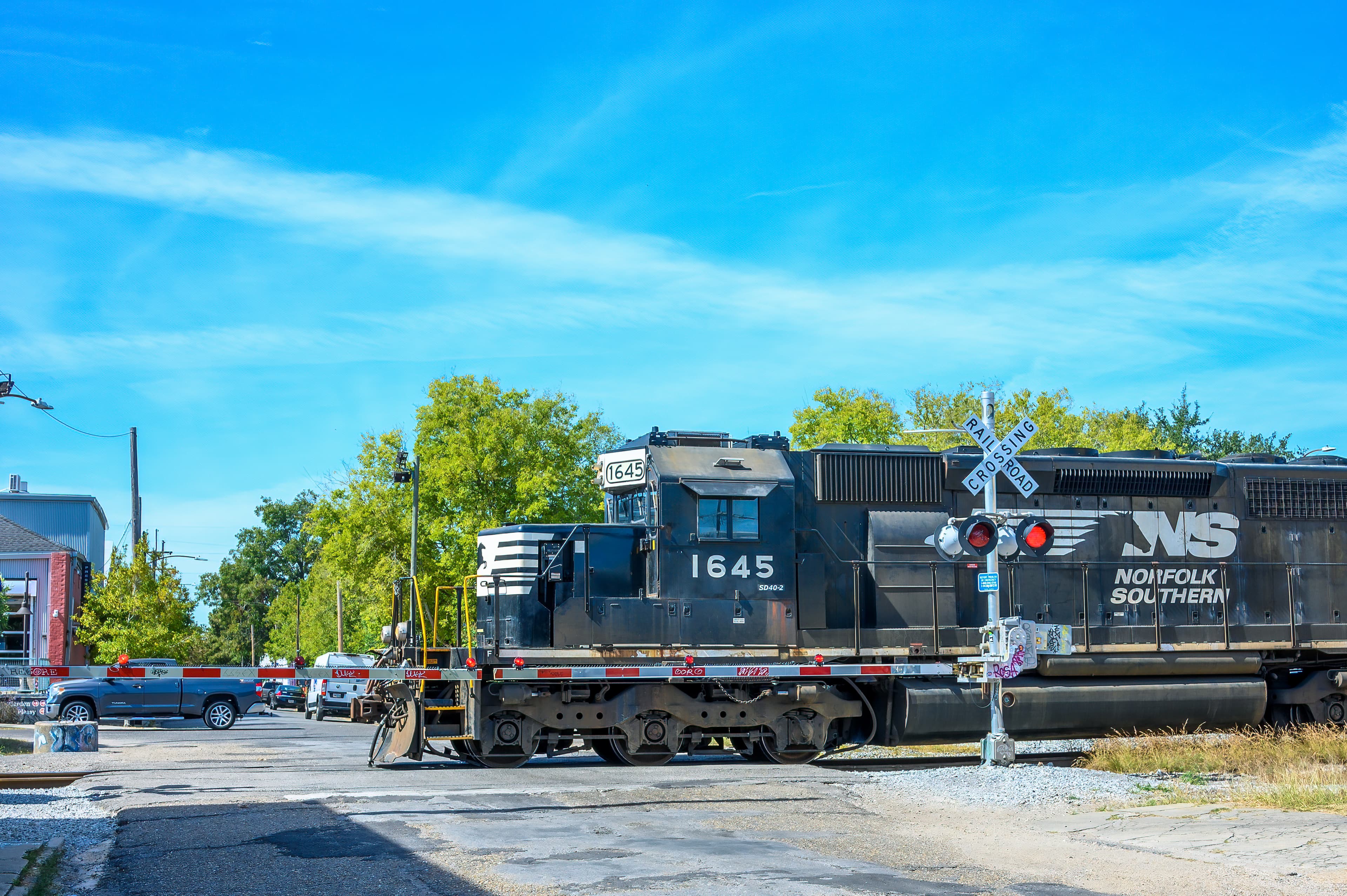 A Norfolk Southern locomotive crosses a street on October 21, 2023 in New Orleans.