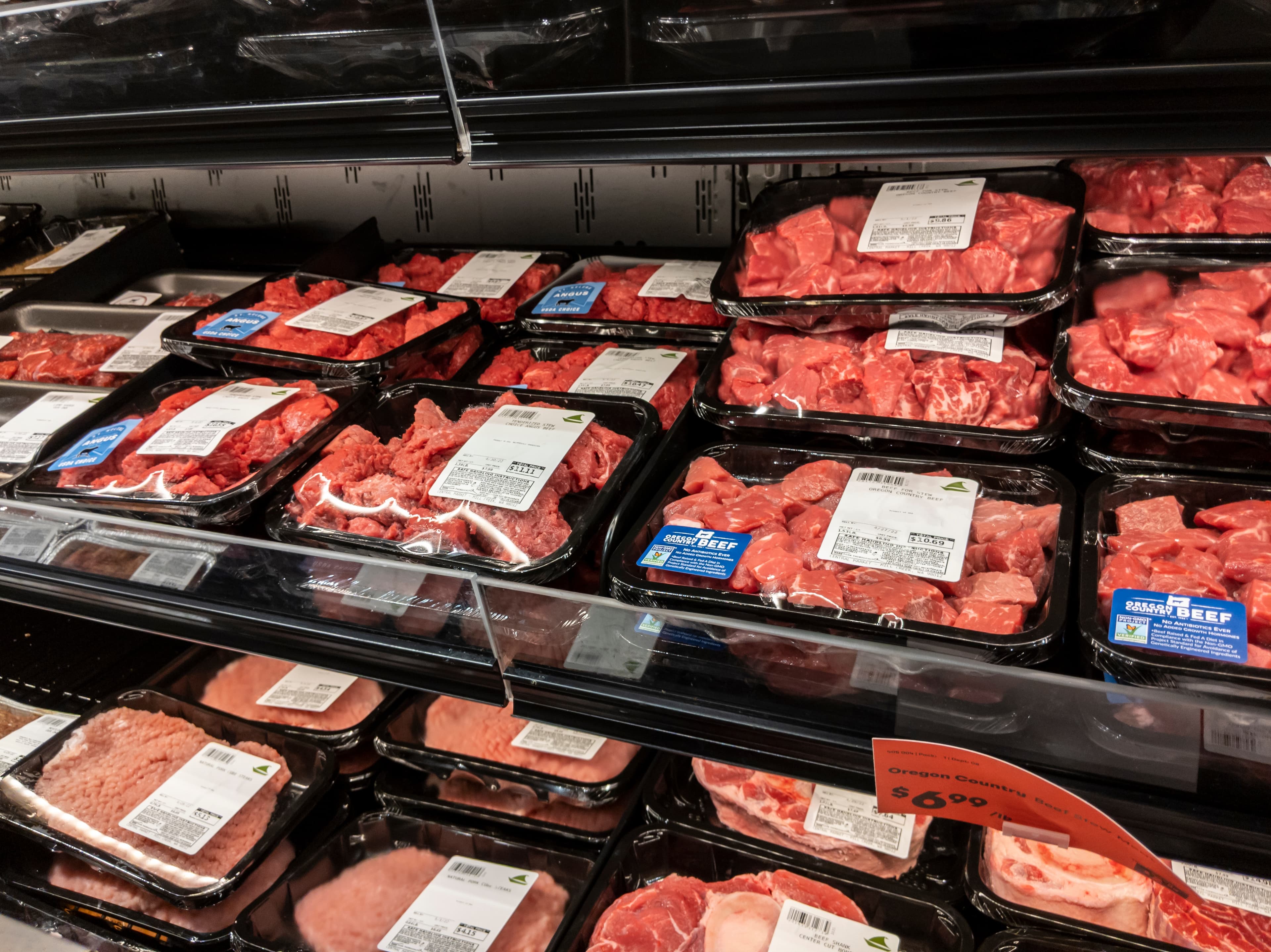 Mill Creek, WA USA - circa May 2022: Angled, selective focus on stew meat packaged up in the refrigerated section of a Town and Country grocery store.