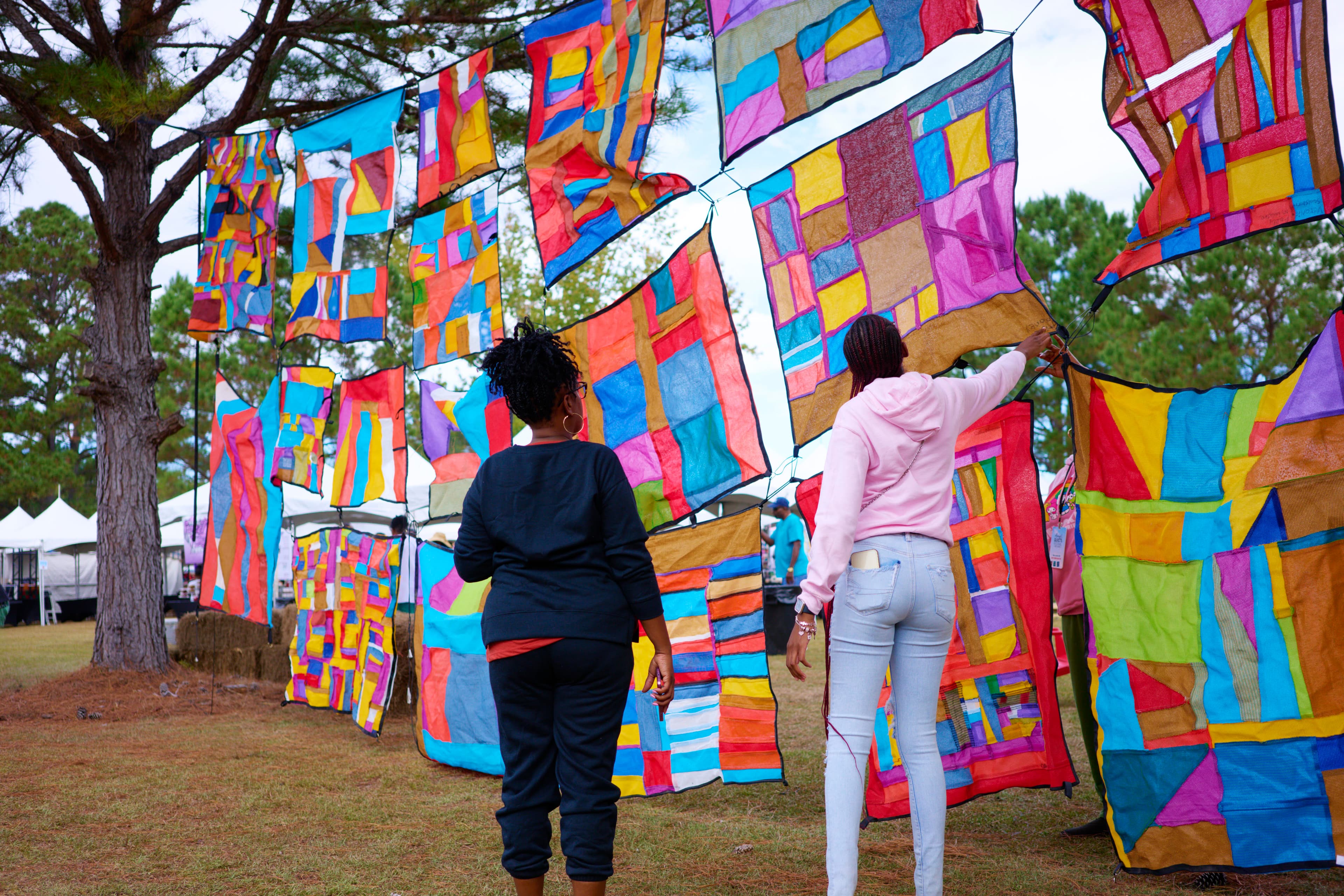 The annual Airing of the Quilts Festival features hands-on workshops, guided tours of the community, exhibitions local food vendors and live music.