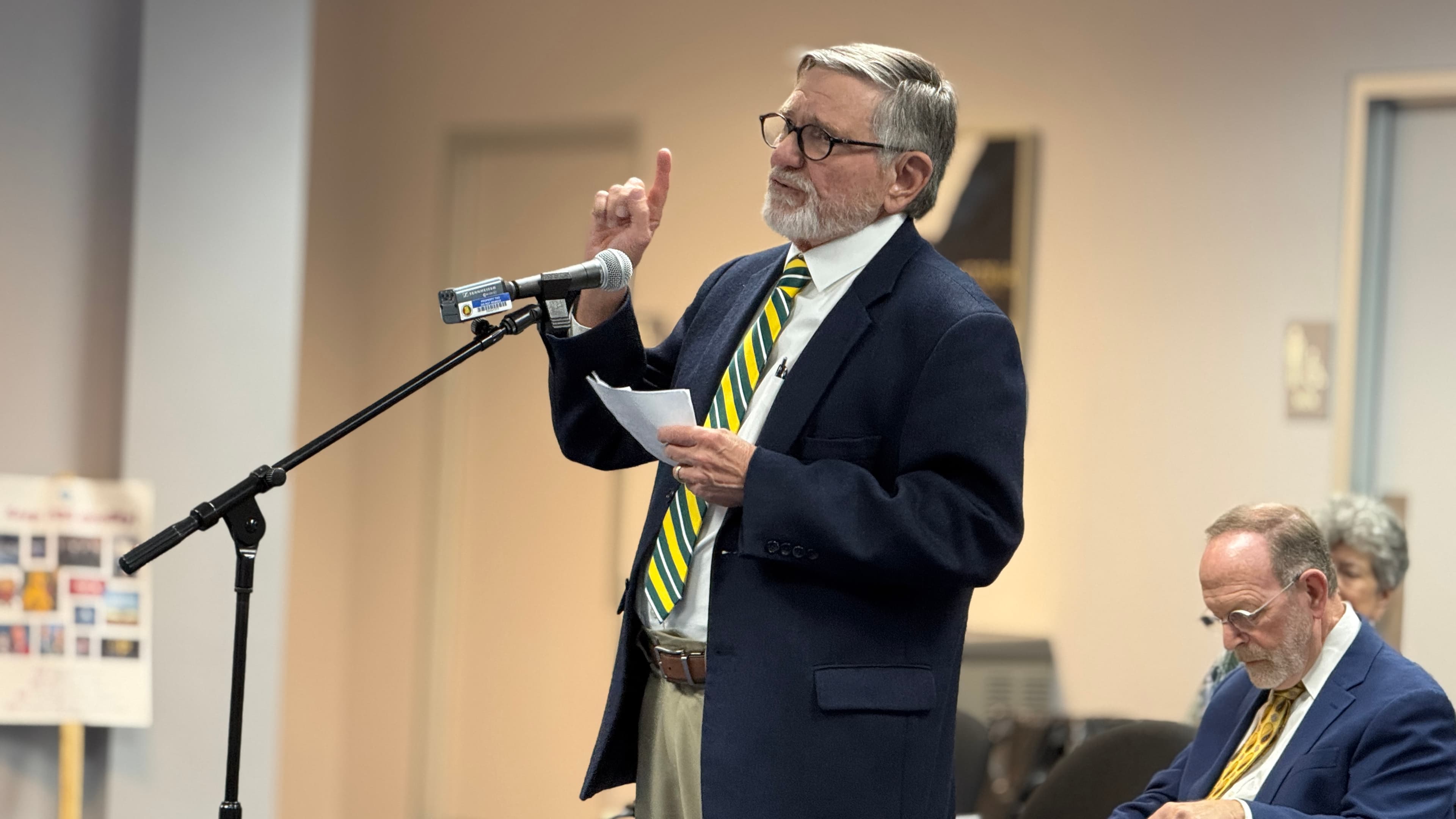 Resident John Northrop objects to the survey during the public comments portion of the meeting. (Jacob Holmes/APR)