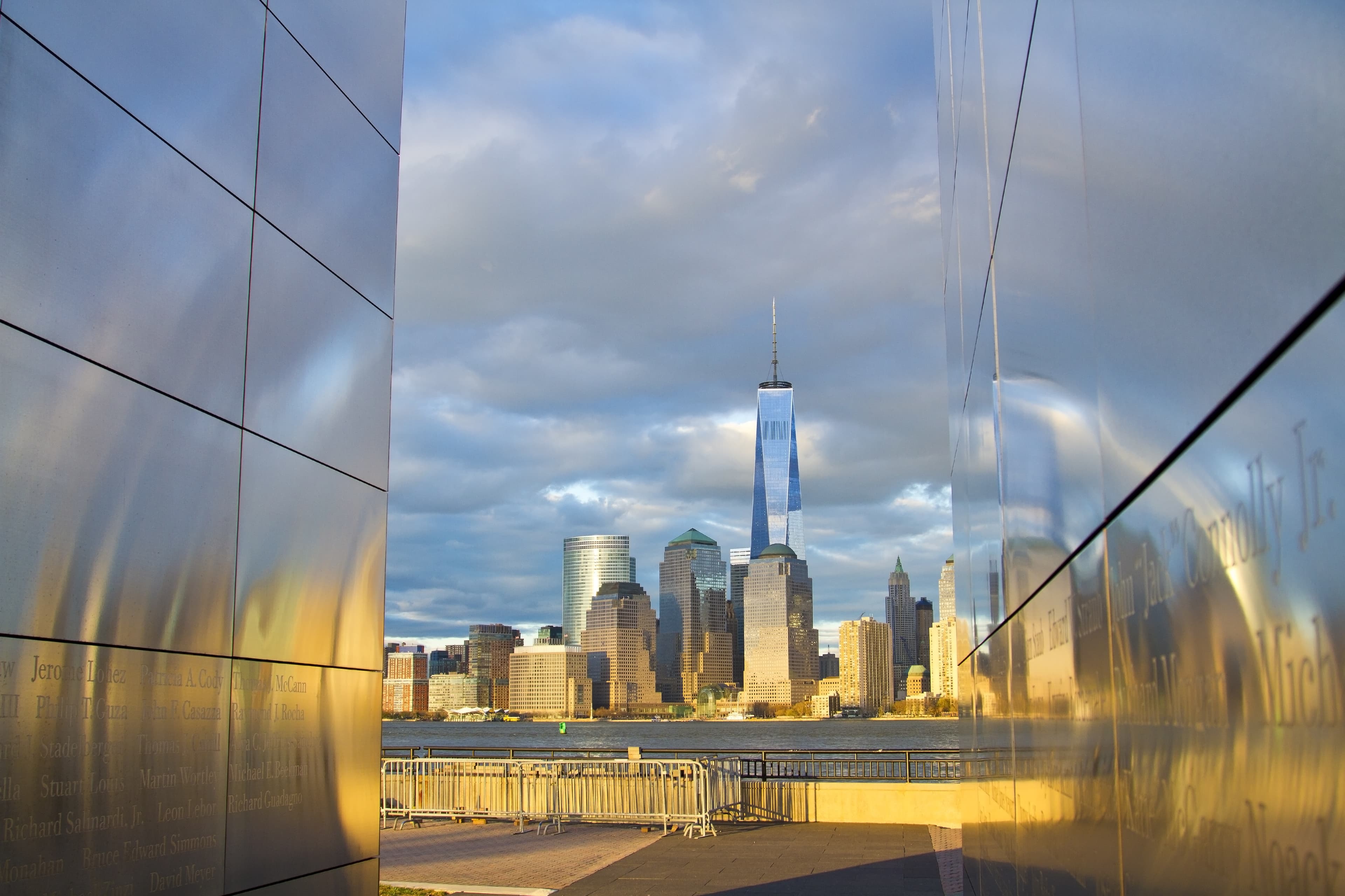 World Trade Center Freedom Tower in Lower Manhattan New York City skyline with American Flag