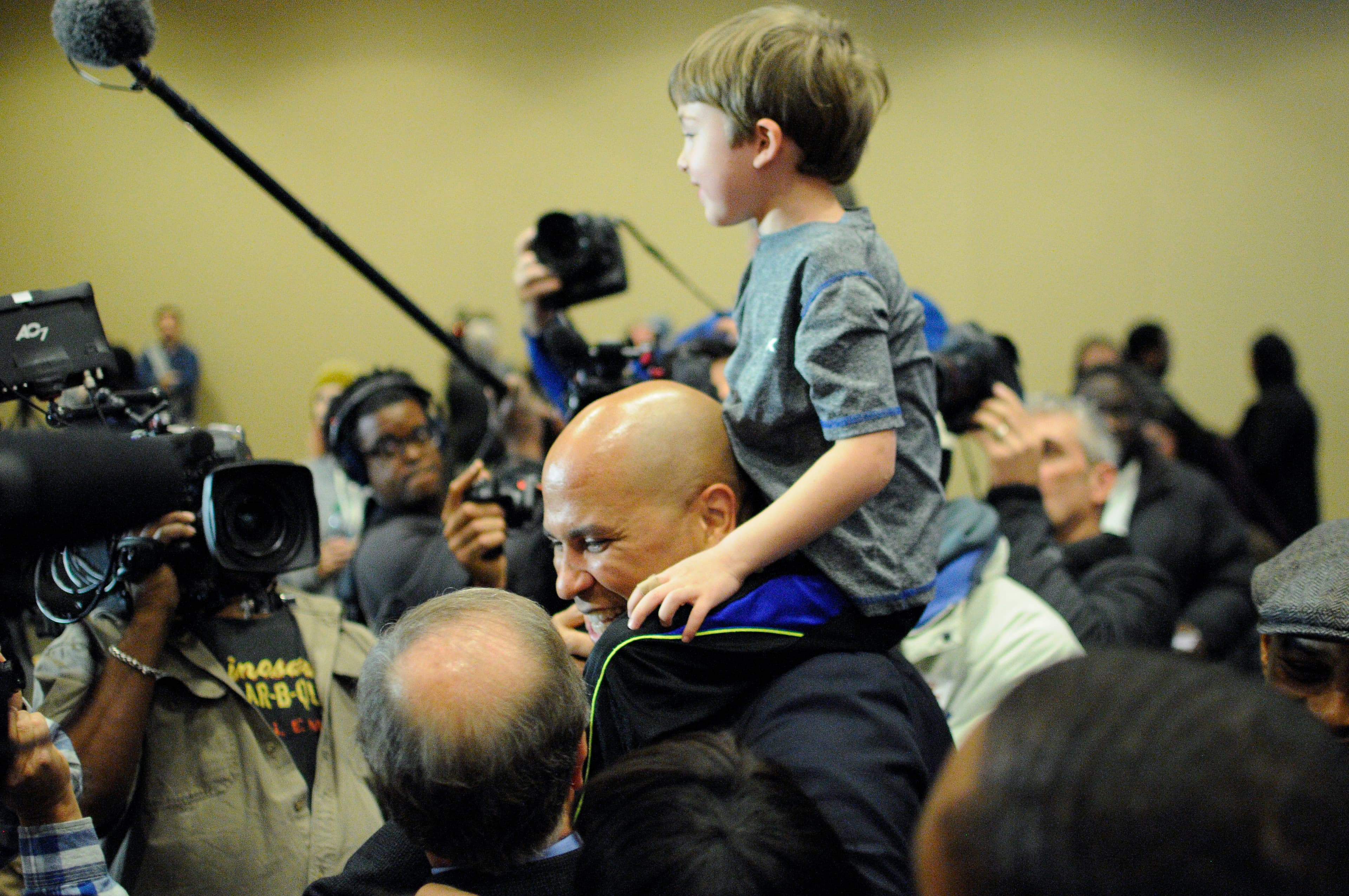 New Jersey Sen. Cory Booker greets Doug Jones supporters at a campaign GOTV rally on Saturday, Dec. 9, 2017.