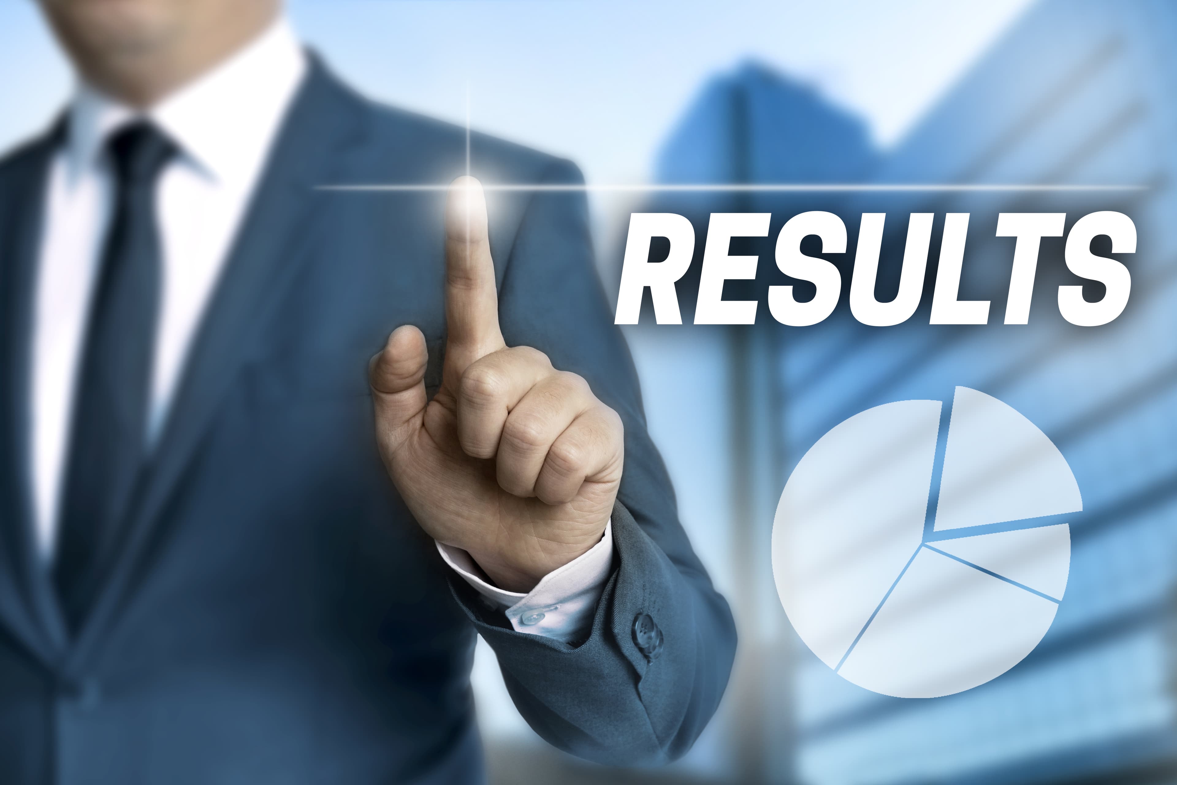 results touchscreen is operated by businessman.