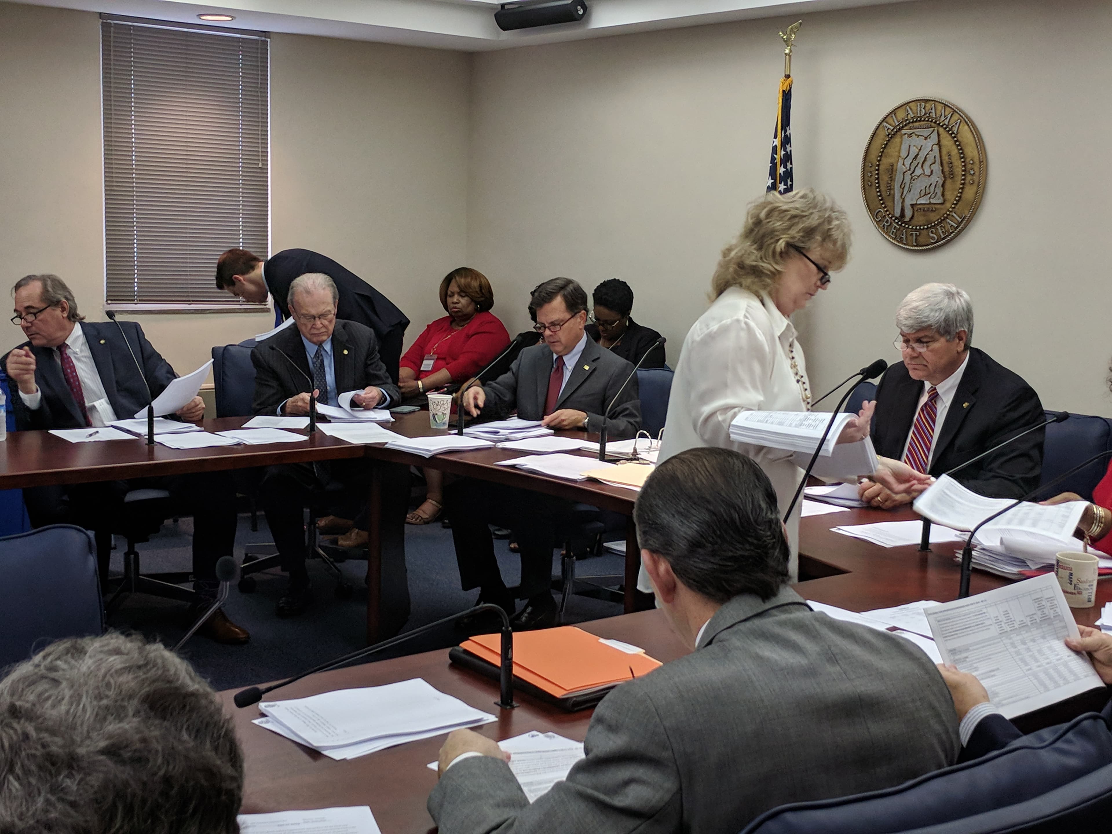Senators receive a copy of the General Fund budget substitute on Wednesday.