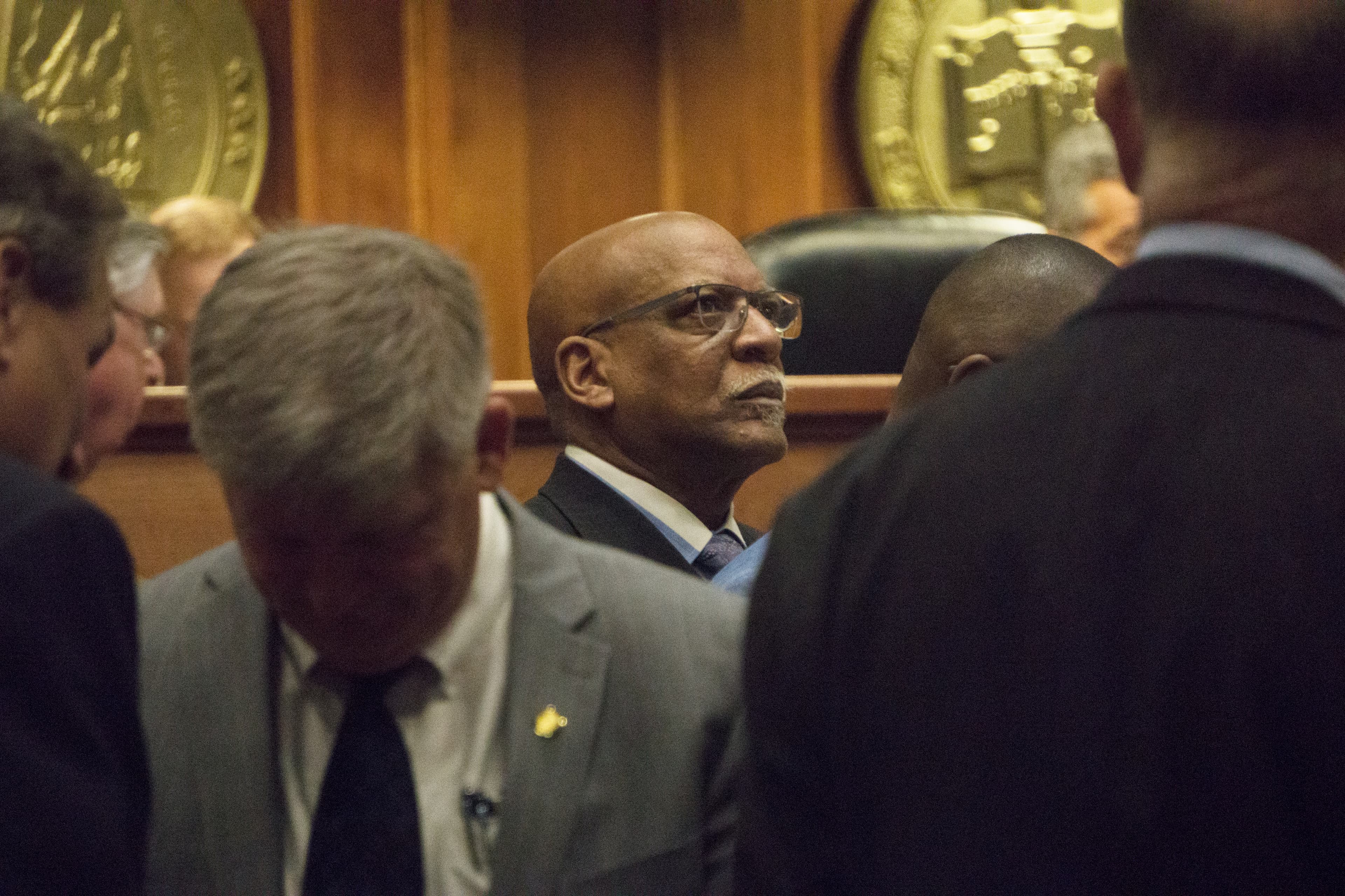 Sen. Rodger Smitherman, center, on the Senate floor.