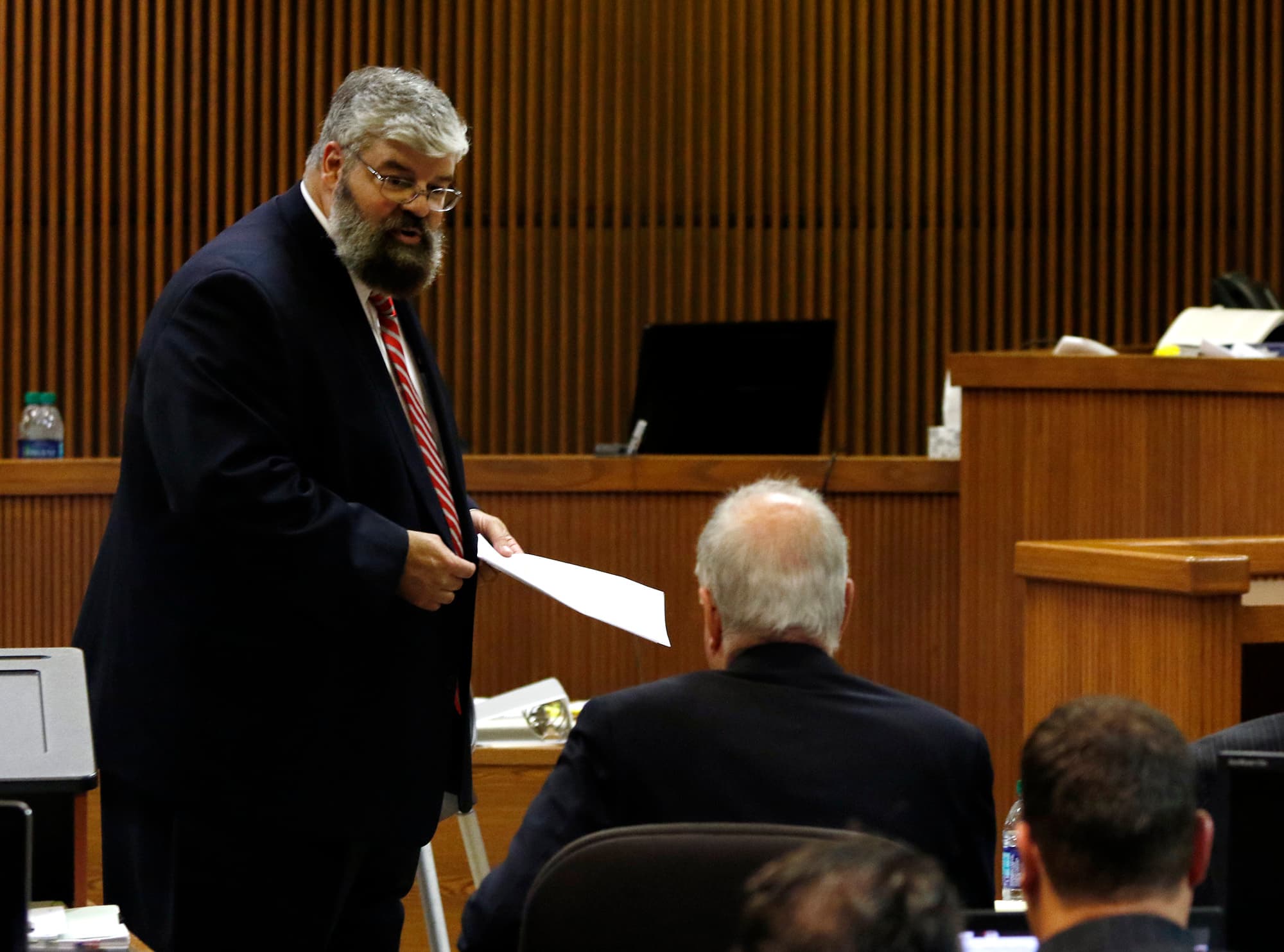 Prosecutor Matt Hart and defense attorney Bill Baxley have a conversation over objections in court during the Alabama speaker Mike Hubbard trial on Tuesday, May 31, 2016 in Opelika, Alabama.