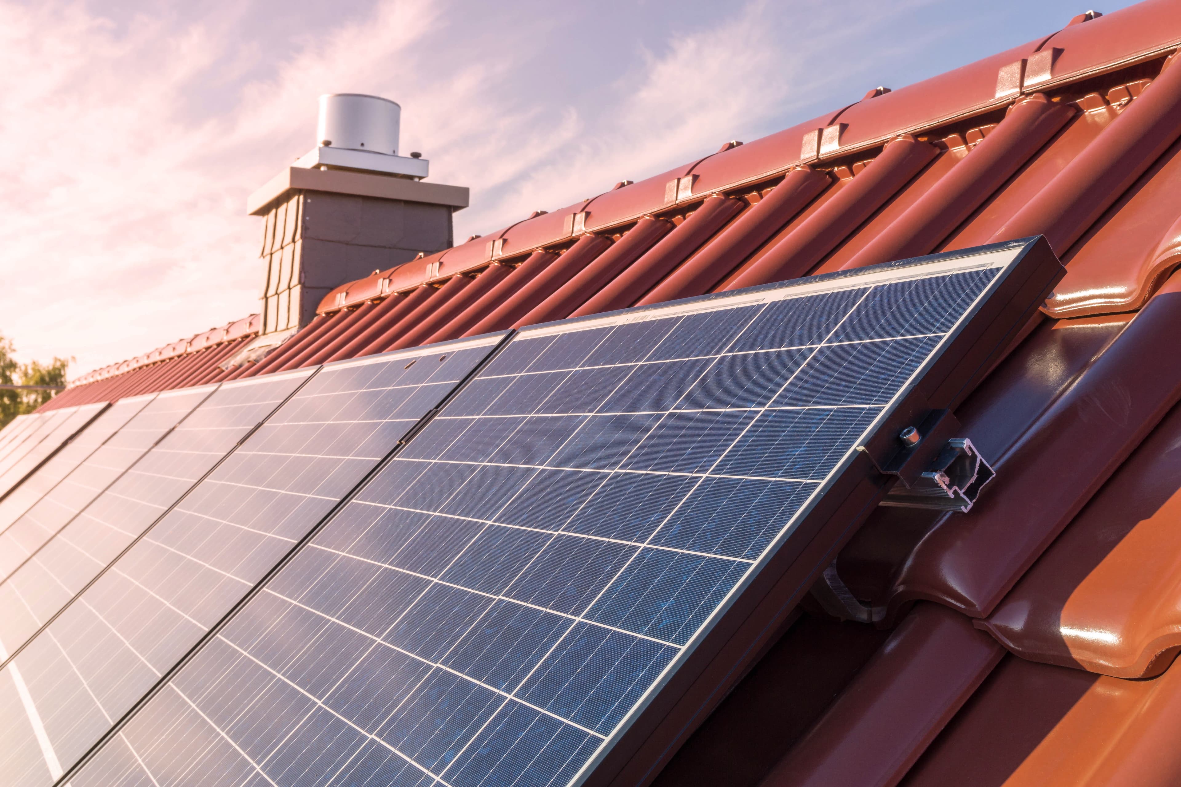solar panesl or photovoltaic plant on the roof of a house