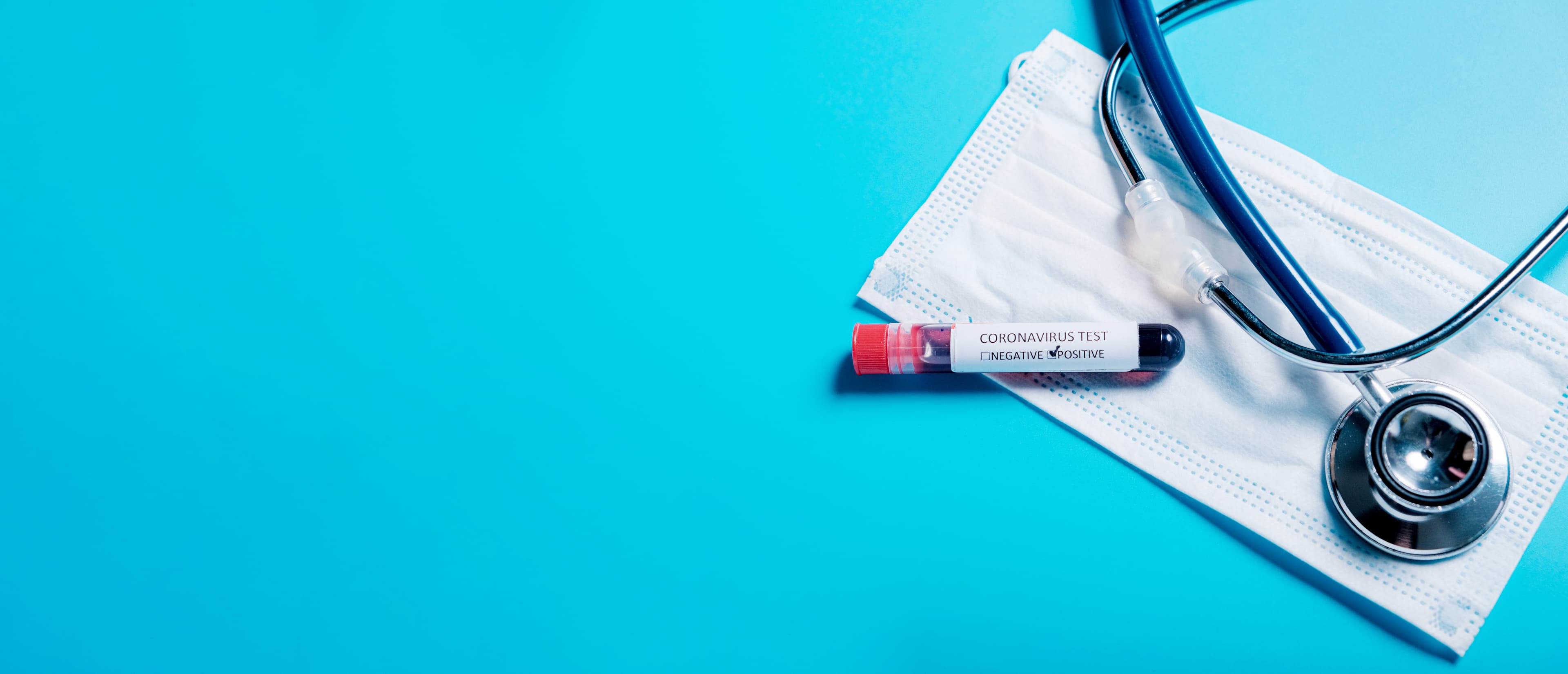 2019-nCoV in Wuhan, China. virus Coronavirus blood test in Laboratory Coronavirus test list medical form, test blood tubes stethoscope on blue copy space background for a banner.