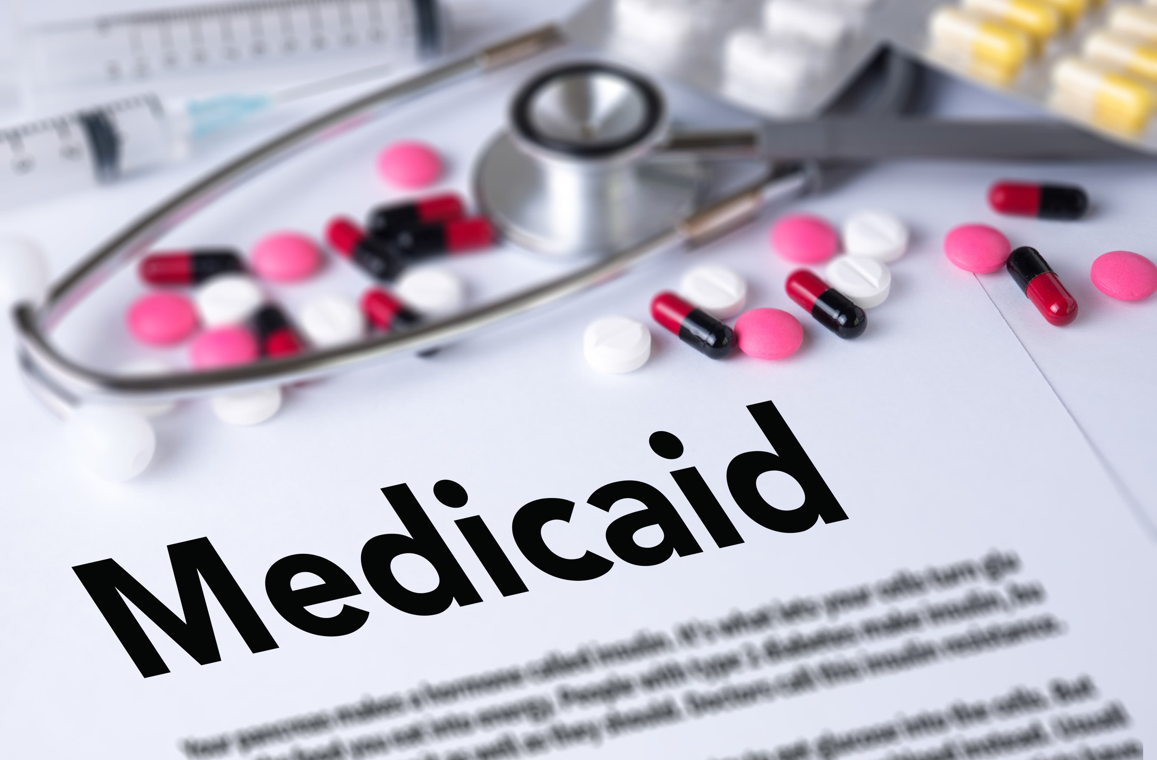 Medical insurance and Medicaid and stethoscope.