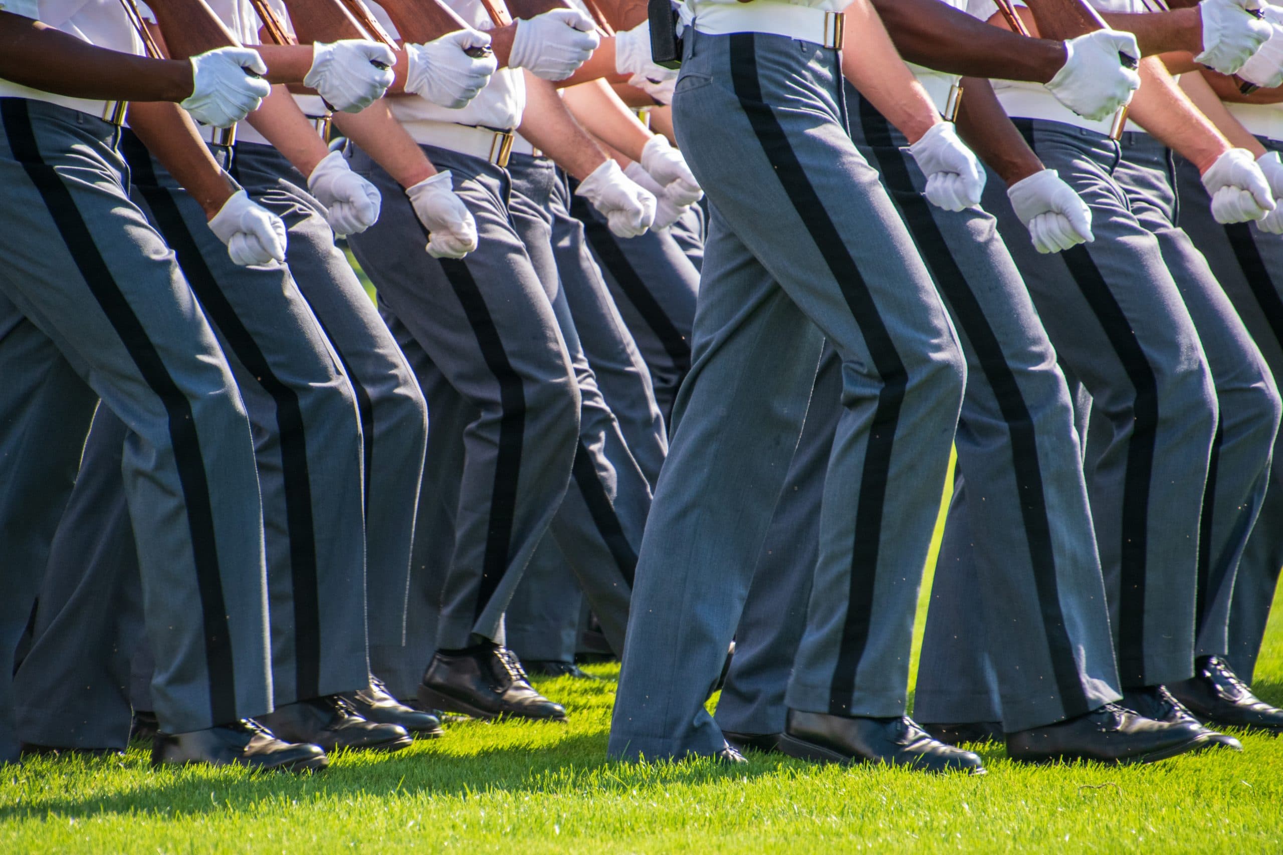 Lower body view of the gray uniform pants of Army cadets as they march