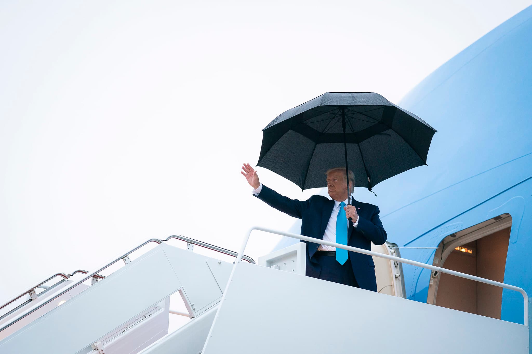 President Donald J. Trump waves as he boards Air Force One at Joint Base Andrews, Md., Saturday, Sept.26, 2020, en route to visit Middletown, Pa. (Official White House Photo by Tia Dufour)